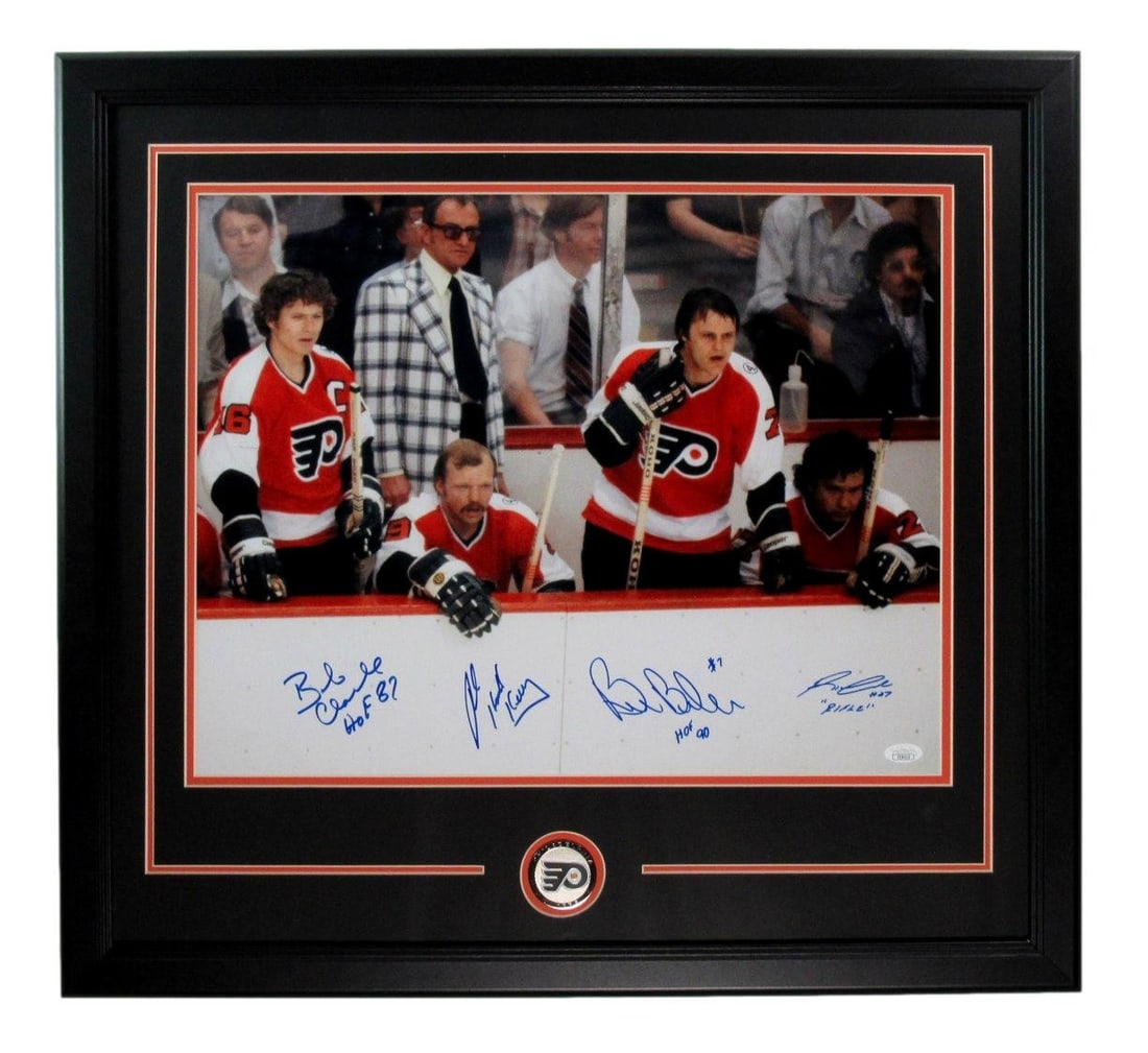 Clarke/ Barber/ Leach/ Kelly Flyers Multi-Auto/ Signed 16x20 Photo Framed JSA 197403: Clarke/ Barber/ Leach/ Kelly Flyers Multi-Auto/ Signed 16x20 Photo Framed JSA 197403 Signed by multiple Philadelphia Flyers players, this framed photo showcases the team's rich history. The multi-auto