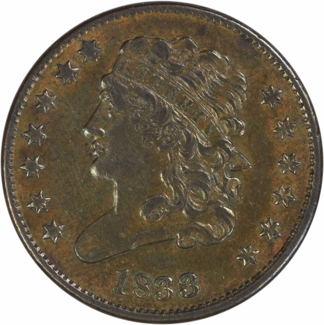 1833 Half Cent EF Uncertified: 1833 Half Cent EF Uncertified 1833 Half Cent EF Uncertified - A Rare and Historic Copper Coin. This circulated example from the Philadelphia mint features John Reich's classic head design on a plain e