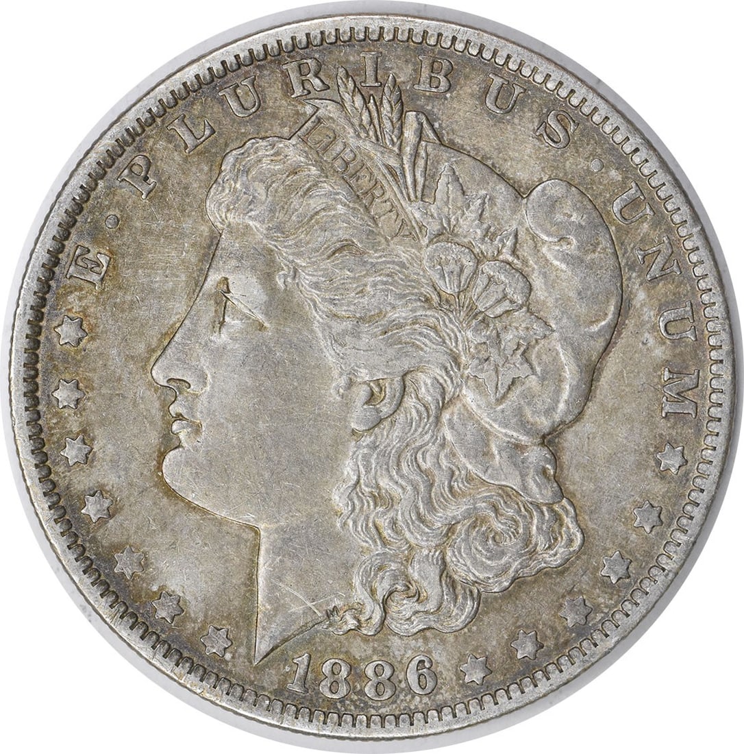 1886-O Morgan Silver Dollar EF Uncertified: 1886-O Morgan Silver Dollar EF Uncertified The 1886-O Morgan Silver Dollar EF Uncertified is an exceptional example of American numismatics, boasting its original reeded edge and a rich silver composi