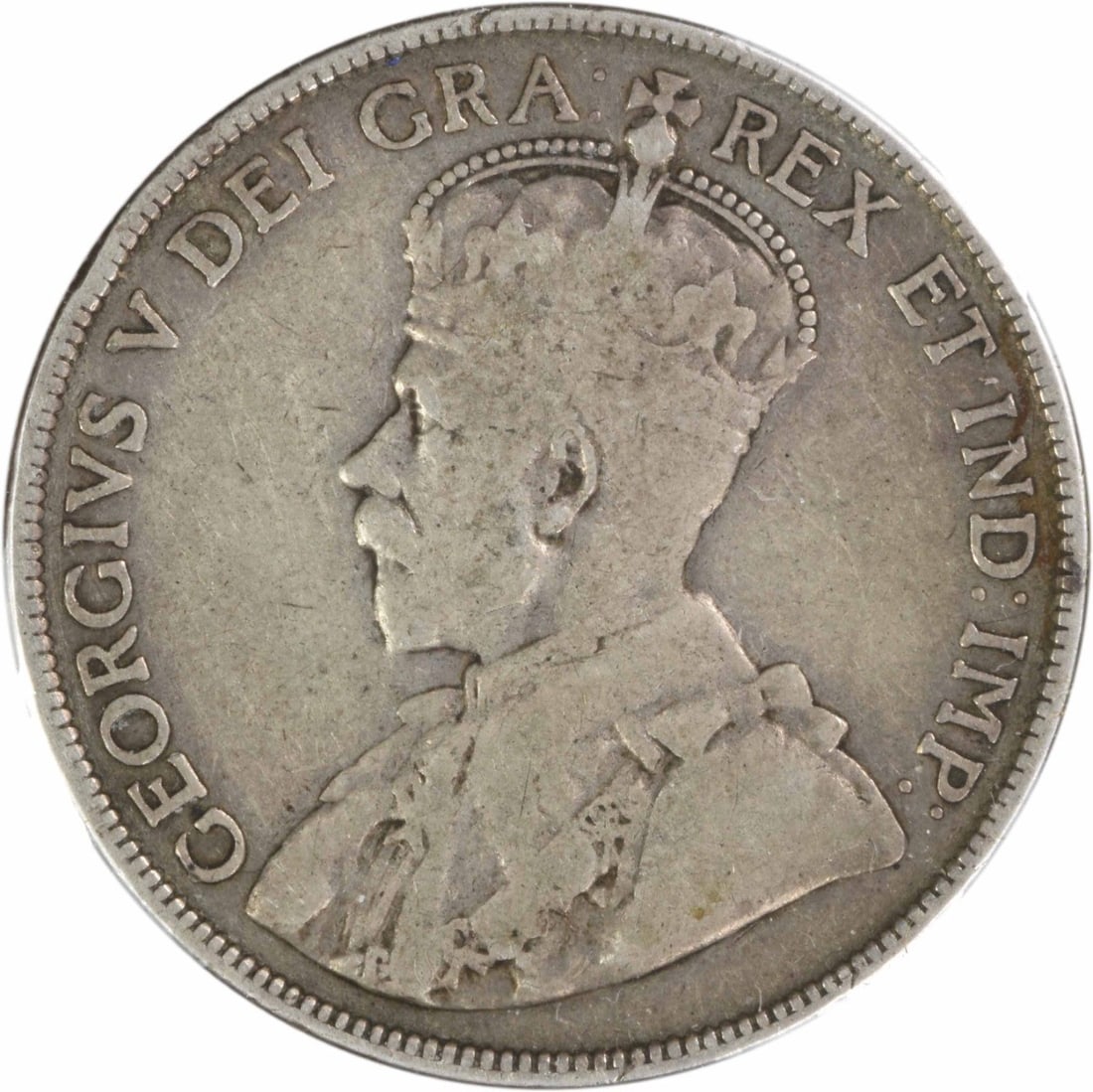 1914 Canada 50 Cents KM25 F Uncertified: 1914 Canada 50 Cents KM25 F Uncertified Circulated in 1914, this Canada 50 Cents coin features the KM25 designation and an F grade. The coin has been certified as circulated and bears a signature. Its