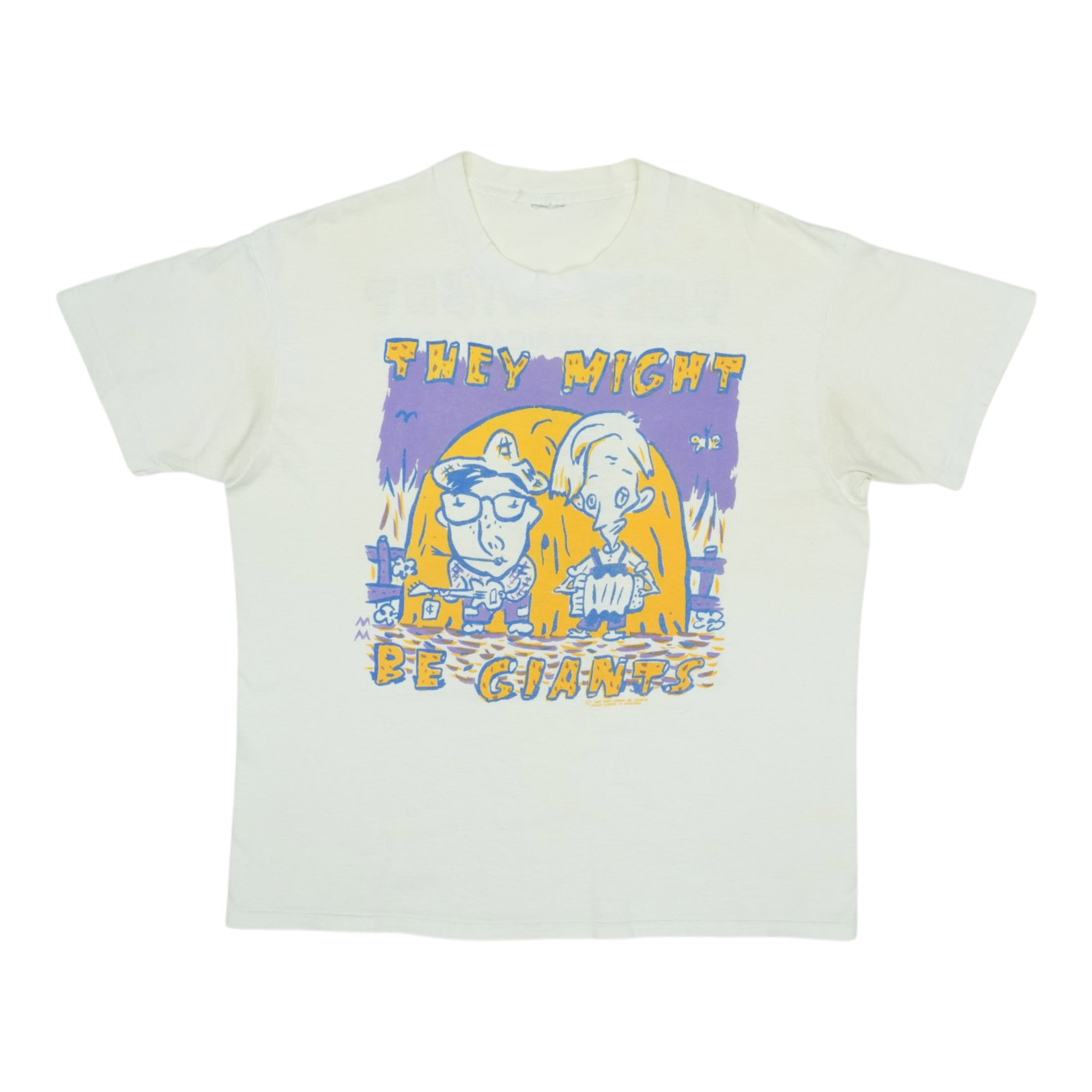 Might Be Giants 1990 Tour Shirt: Might Be Giants 1990 Tour Shirt Authentic Might Be Giants tour shirt from their 1990 tour, featuring the iconic band's logo and design. This vintage tee has been carefully evaluated for its condition 