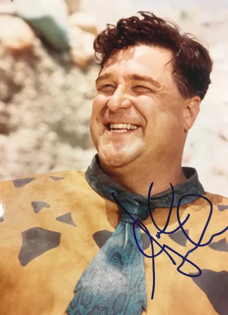 Autographed Celebrity Photo by John Goodman: Autographed Celebrity Photo by John Goodman 8x10 celebrity photo signed in blue sharpie by John Goodman. The photo bears the signature across its front, making it a unique collectible for fans of the 