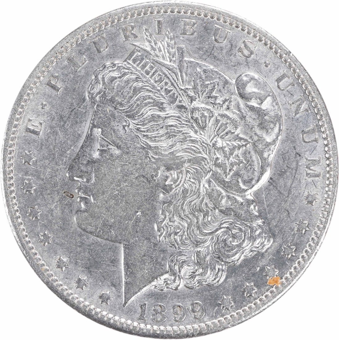 Silver Dollar AU Uncertified 1899 Morgan: Silver Dollar AU Uncertified 1899 Morgan The 1899 Morgan dollar, certified as Uncertified Circulated, boasts an impressive silver composition and reeded edge. This AU coin features a diameter of 38.10