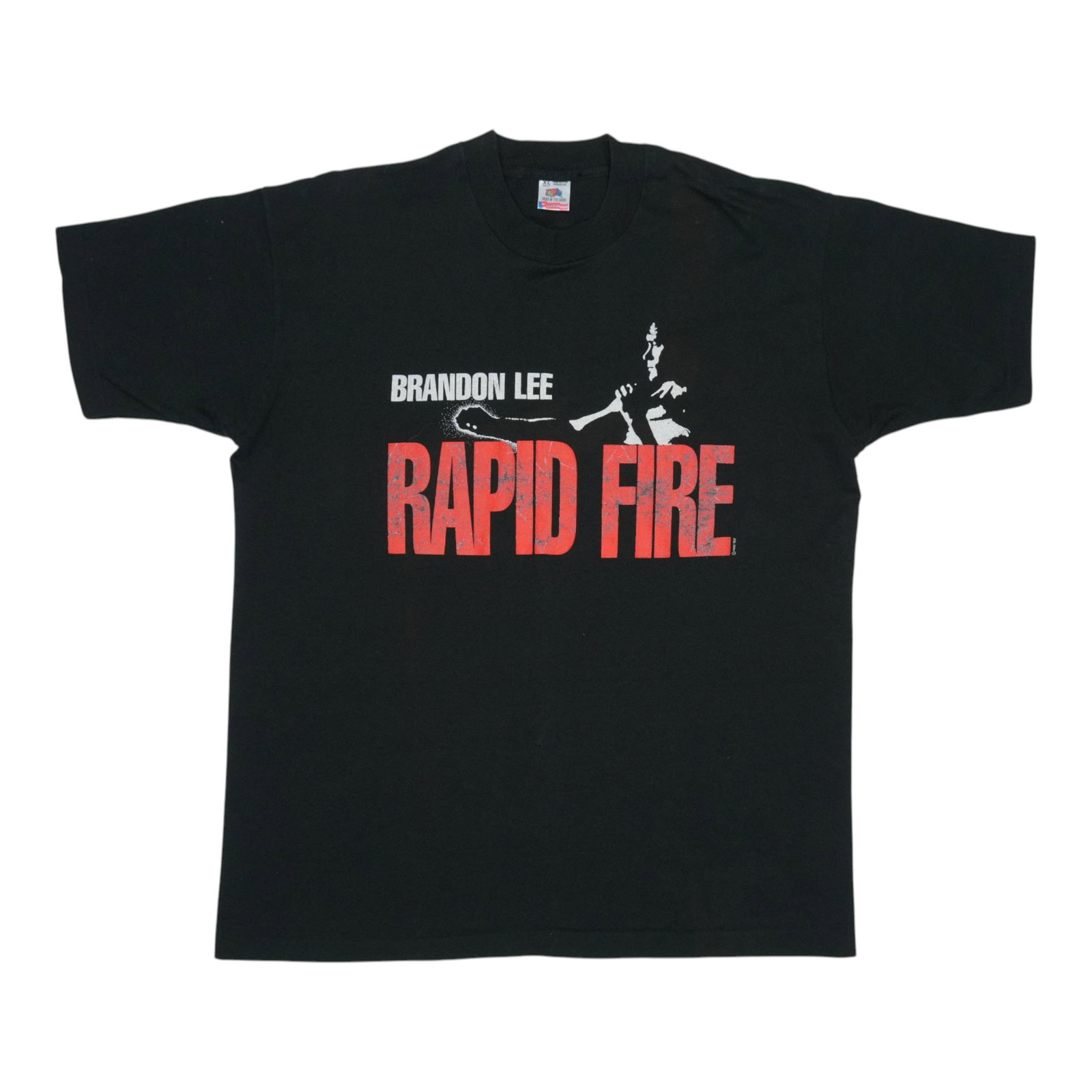 1992 Rapid Fire Brandon Lee Movie Promo Shirt: 1992 Rapid Fire Brandon Lee Movie Promo Shirt Authentic 1992 Rapid Fire promotional shirt from the Brandon Lee movie, featuring bold graphics and a unique design. This vintage tee has been carefully p