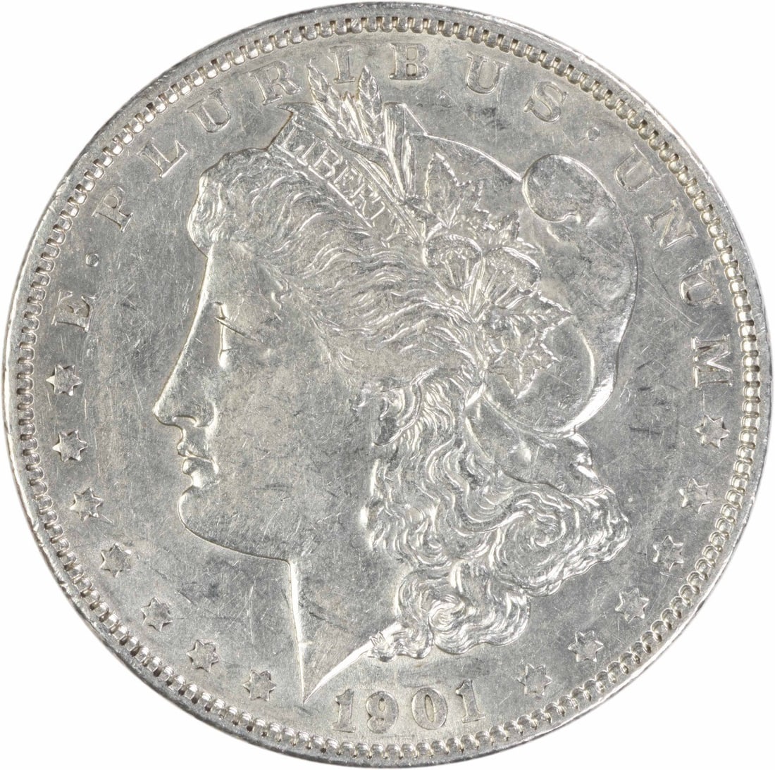 Silver Dollar Morgan AU Uncertified 1901: Silver Dollar Morgan AU Uncertified 1901 The 1901 Silver Dollar Morgan features an AU grade, indicating its high level of detail and luster. Made from 90% silver and 10% copper, this circulated coin s