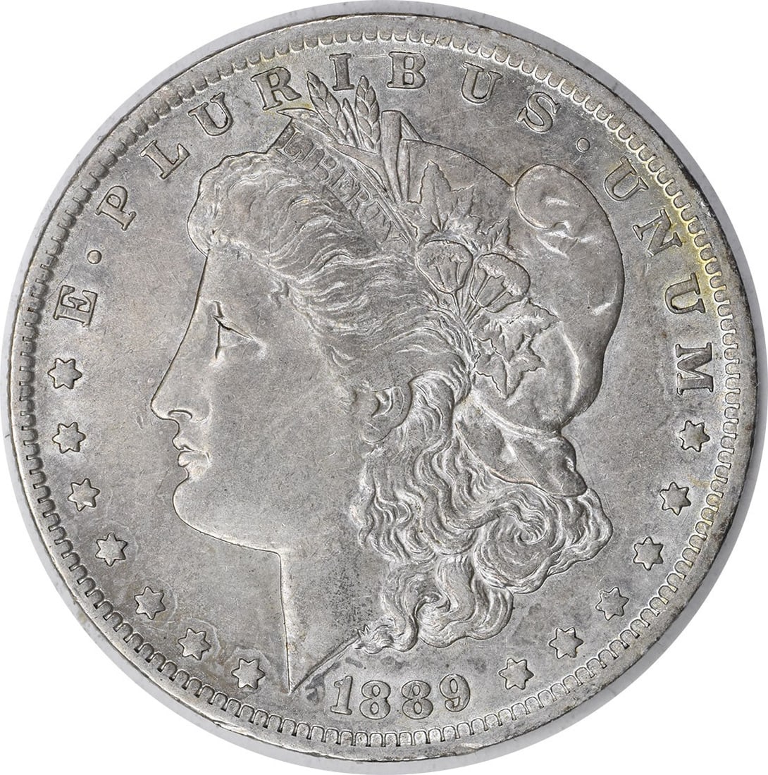 Silver Dollar Morgan Uncertified AU 1889: Silver Dollar Morgan Uncertified AU 1889 The 1889 Silver Dollar Morgan Uncertified AU features the iconic design of George T. Morgan, with its distinctive reeded edge and 90% silver composition. Made 