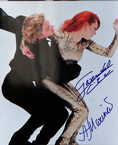 GOLD 2002 SIGNED PEIZERAT GWENDAL MARINA ANISSINA 180425: GOLD 2002 SIGNED PEIZERAT GWENDAL MARINA ANISSINA 180425 Gwendal Marina Anissina's signature on this gold photo from the 2002 Olympics bears witness to her artistic presence. The 180425 date stamp add