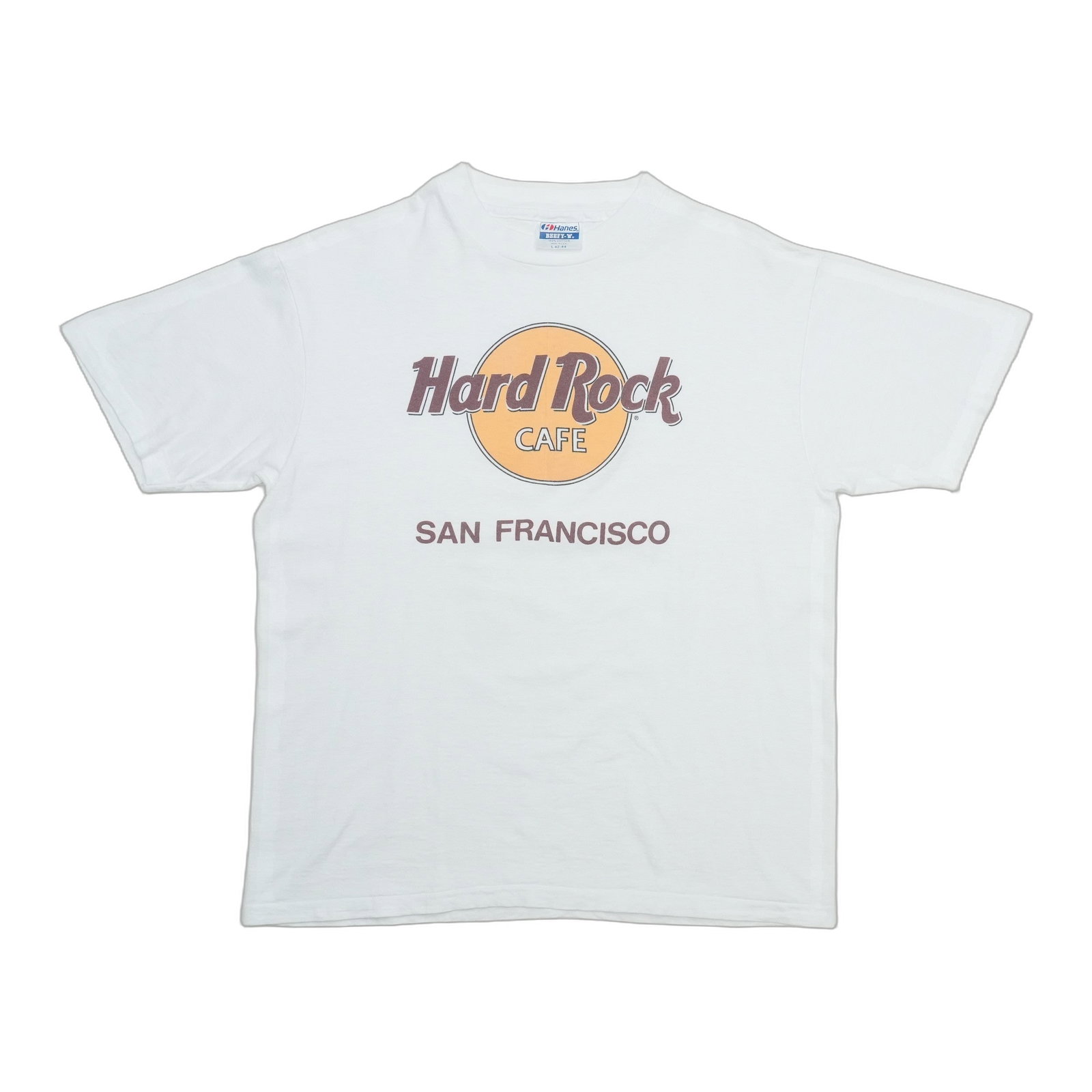 Rock cafe shirt 1980s San Francisco hard: Rock cafe shirt 1980s San Francisco hard Rock cafe shirt from the iconic 1980s San Francisco music scene. This vintage tee features bold graphics and colors, evoking the era's vibrant punk rock spirit