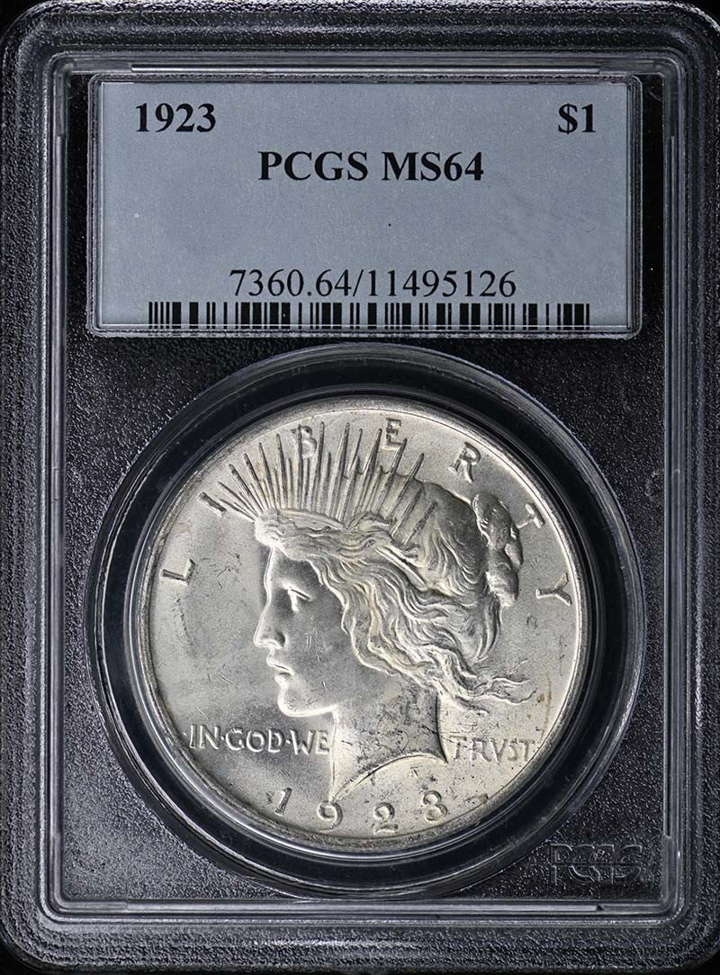 1923 $1 Peace Dollar PCGS MS64: 1923 $1 Peace Dollar PCGS MS64 The 1923 $1 Peace Dollar, graded MS64 by PCGS, showcases the iconic design of the Philadelphia Mint. This uncirculated coin bears the signature of its creator, but we ca