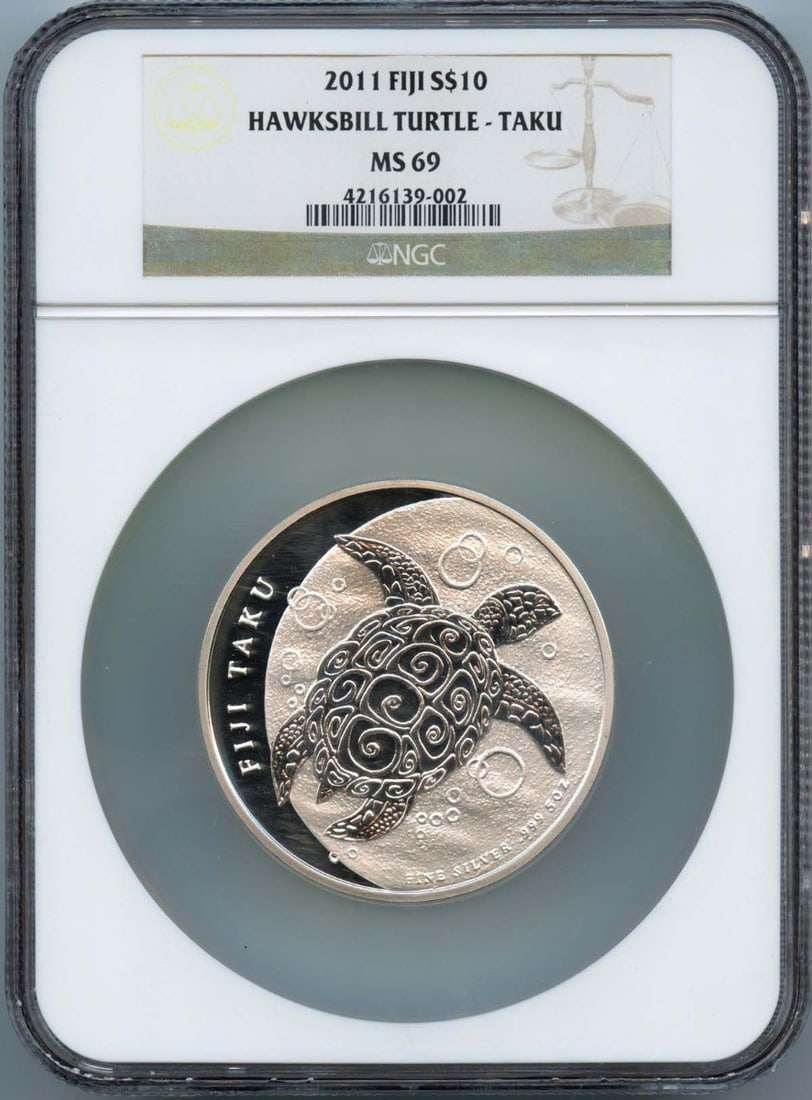 FIJI HAWKSBILL TURTLE 2011 TAKU 5oz S$NGC MS69: FIJI HAWKSBILL TURTLE 2011 TAKU 5oz S$NGC MS69 The 2011 Taku Fiji Hawksbill Turtle coin, graded MS69 by the NGC, boasts exceptional detail and luster in its uncirculated state. This stunning silver co