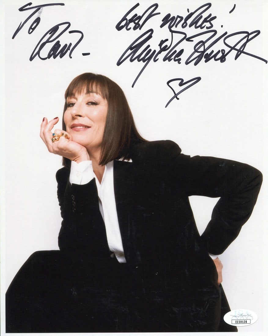 Huston Autographed 8x10 Photo by JSA: Huston Autographed 8x10 Photo by JSA Anjelica Huston's bold, expressive signature in black sharpie adds a touch of elegance to this 8x10 photo. Certified by James Spence Authentication (JSA) with a un