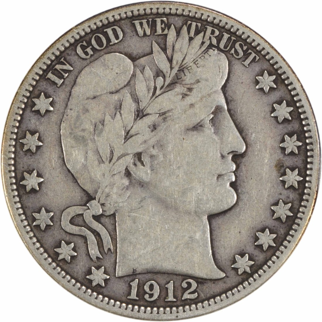Barber Half Dollar 1912 Silver VF Uncertified: Barber Half Dollar 1912 Silver VF Uncertified The 1912 Barber Half Dollar is a classic silver coin featuring George Washington on its obverse and a flowing ribbon on its reverse. This circulated examp