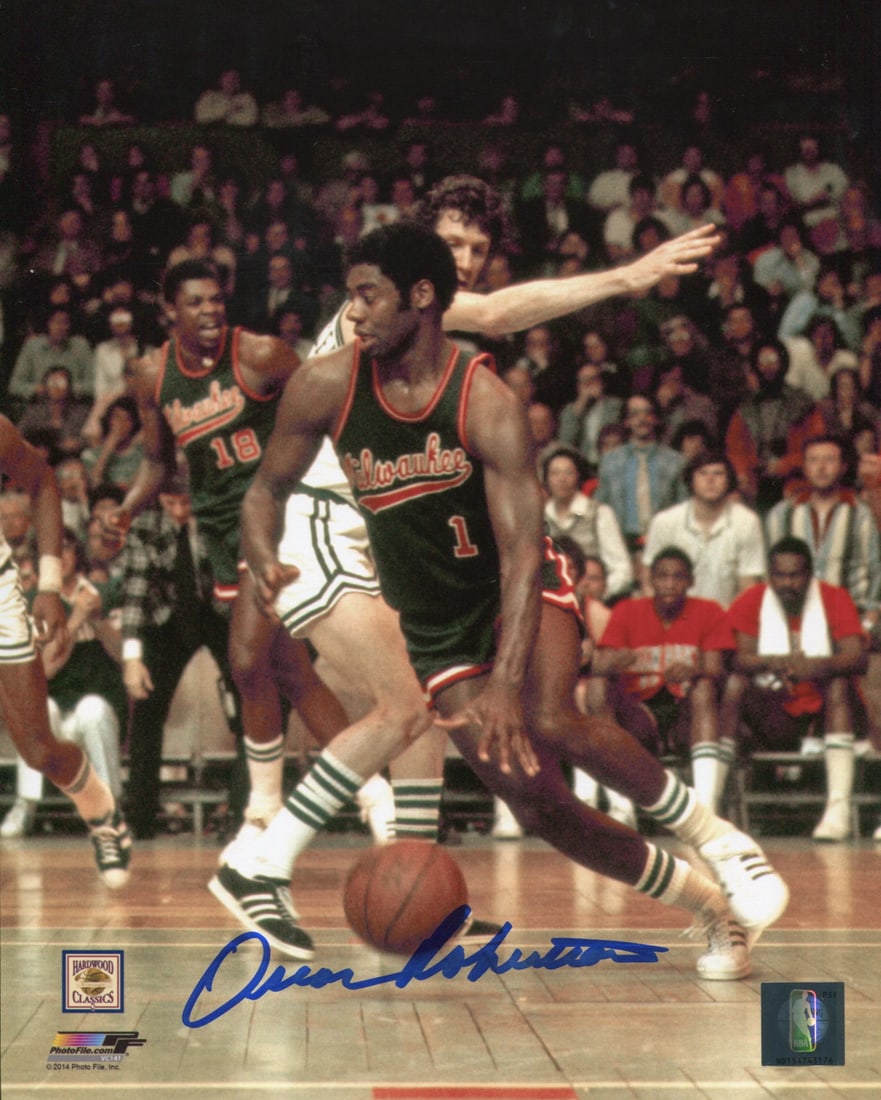 Oscar Robertson Autographed Milwaukee Bucks 8x10 Basketball Photo: Oscar Robertson Autographed Milwaukee Bucks 8x10 Basketball Photo Item Specifics: Signed in blue sharpie across the front of the photo Autograph is authenticated by , and will be accompanied by a COA 