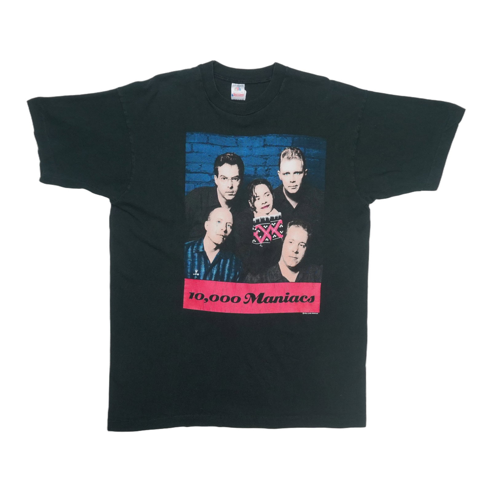 Our Time In Eden Tour Shirt by 10000 Maniacs 1992: Our Time In Eden Tour Shirt by 10000 Maniacs 1992 Our Time In Eden Tour Shirt by 10000 Maniacs, 1992 - A rare opportunity to own a piece of alternative rock history. This iconic tour shirt features th