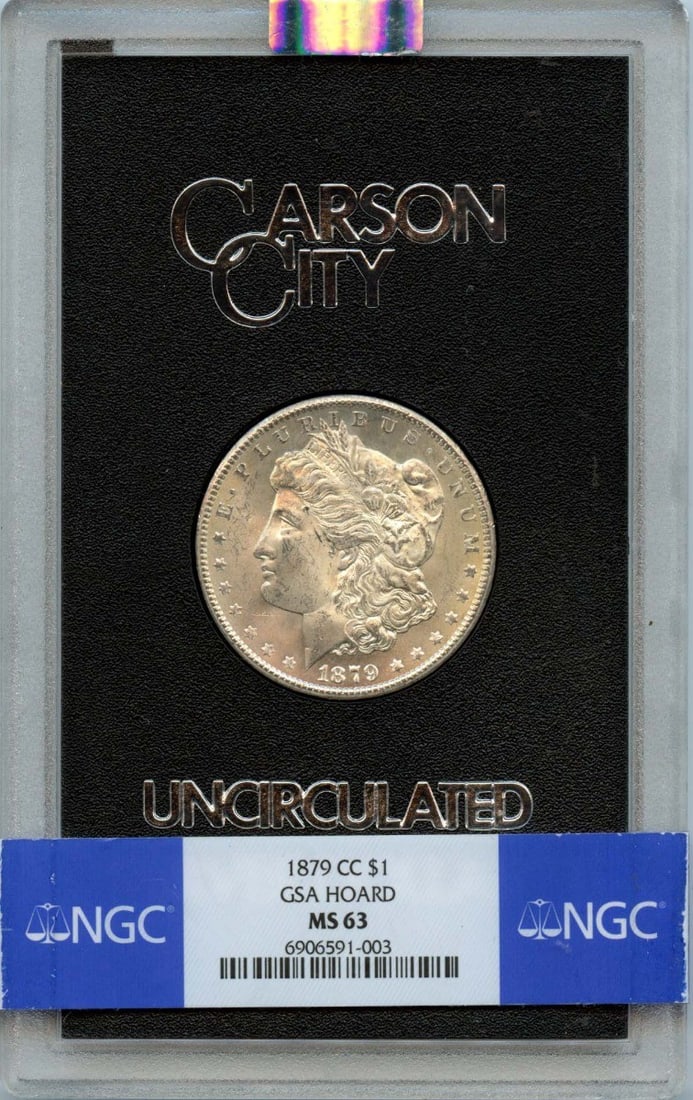 Morgan dollar CC S$1 GSA 1879 NGC MS63 HOARD: Morgan dollar CC S$1 GSA 1879 NGC MS63 HOARD The Morgan dollar CC S$1 GSA 1879 NGC MS63 HOARD is an uncirculated coin with a high grade of MS63, indicating excellent condition and minimal wear. Certif