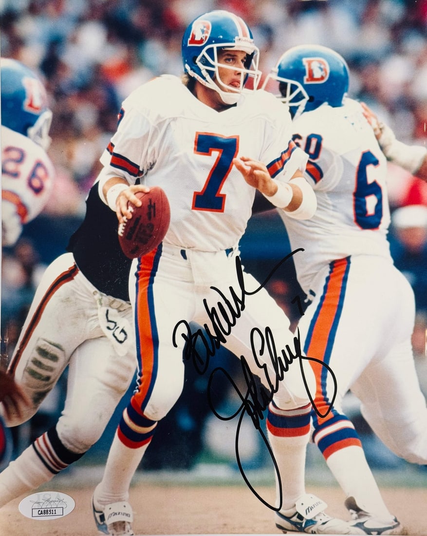 John Elway Autographed 8x10 Football Photo (JSA): John Elway Autographed 8x10 Football Photo (JSA) Signed in black sharpie across the front, John Elway's inscription adds a personal touch to this official 8x10 football photo. The James Spence Authent