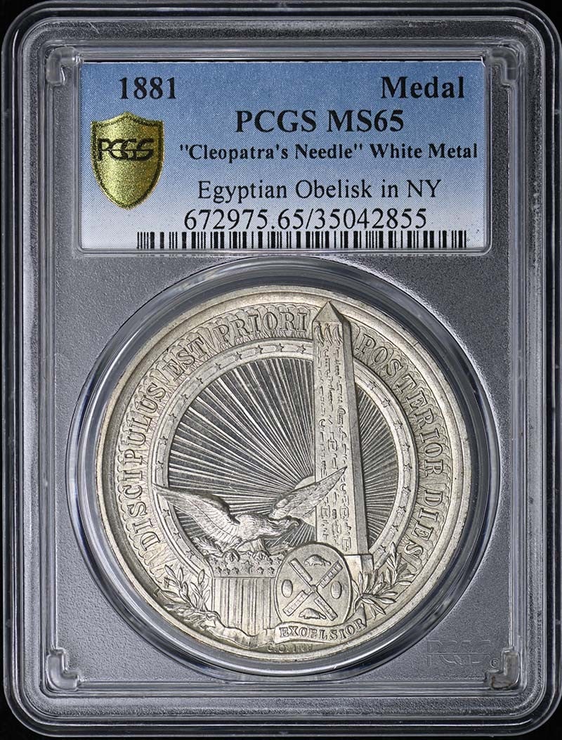 1881 Cleopatra's Needle PCGS MS65 Medal Egyptian Obelisk in NY: 1881 Cleopatra's Needle PCGS MS65 Medal Egyptian Obelisk in NY This 1881 Cleopatra's Needle PCGS MS65 Medal features an uncirculated grade from the prestigious Professional Coin Grading Service (PCGS)
