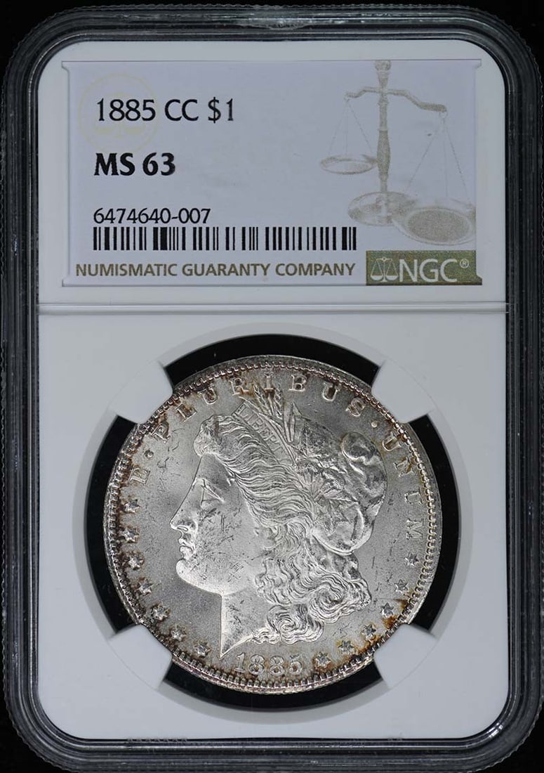 1885-CC Morgan Dollar S$1 NGC MS63: 1885-CC Morgan Dollar S$1 NGC MS63 1885-CC Morgan Dollar S$1 NGC MS63. This highly graded, uncirculated Morgan Dollar features the iconic design of Augustus Saint-Gaudens and boasts a stunning MS63 gr