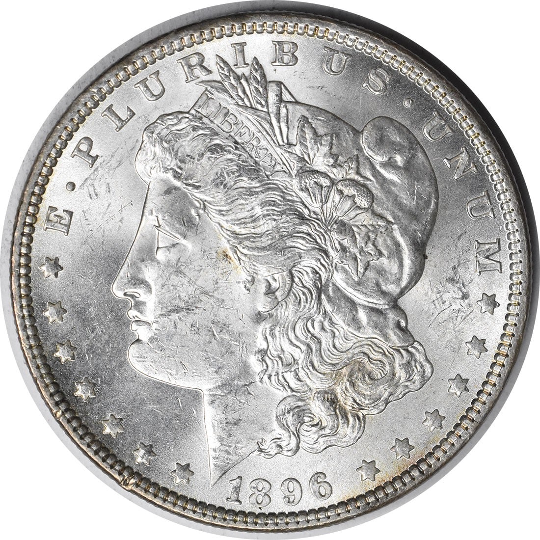 Morgan Silver Dollar Choice BU Toned Uncertified: Morgan Silver Dollar Choice BU Toned Uncertified Choice BU Toned Uncertified Morgan Silver Dollar (1896) - A beautifully toned and preserved example of the iconic Morgan dollar, showcasing its natural
