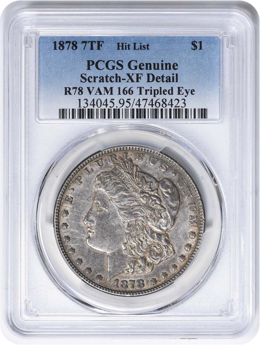 1878 7TF VAM 166 Morgan Dollar Tripled Eye Genuine (Scratch - EF Detail) PCGS: 1878 7TF VAM 166 Morgan Dollar Tripled Eye Genuine (Scratch - EF Detail) PCGS The 1878 VAM 166 Morgan Dollar Tripled Eye is a genuine coin with a unique feature - its tripled eye design. This circulat