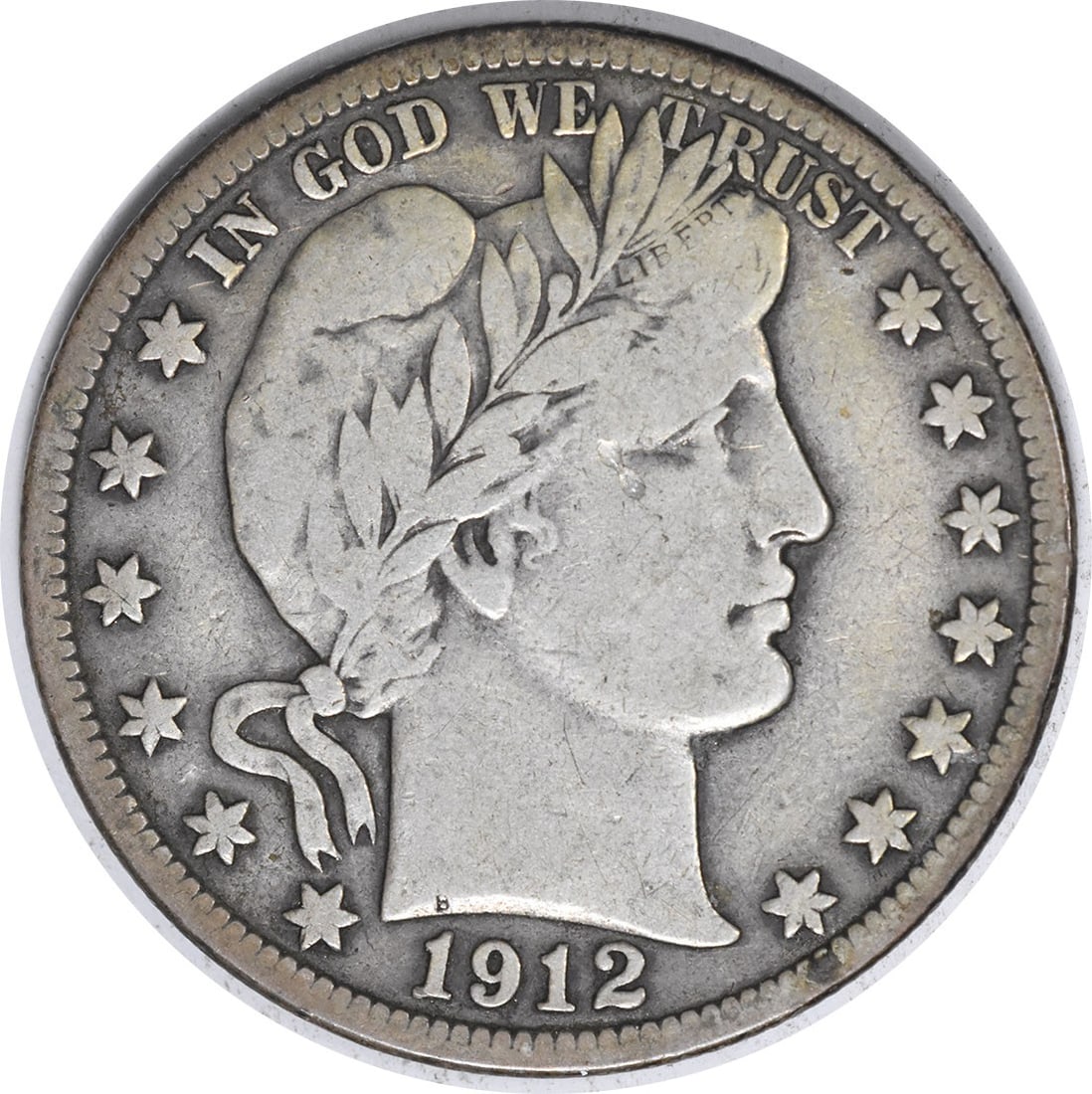 1912-S Barber Silver Half Dollar VF Uncertified: 1912-S Barber Silver Half Dollar VF Uncertified The 1912-S Barber Silver Half Dollar is a circulated coin with a striking VF grade, bearing the signature of its mint. Made from silver and featuring th