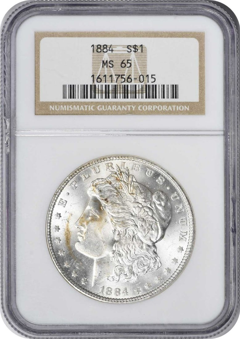 MS65 NGC MORGAN SILVER DOLLAR 1884: MS65 NGC MORGAN SILVER DOLLAR 1884 MS65 NGC MORGAN SILVER DOLLAR 1884 - A Highly Detailed and Certified Piece from the Early Years of American Coinage. This uncirculated Morgan silver dollar, graded M