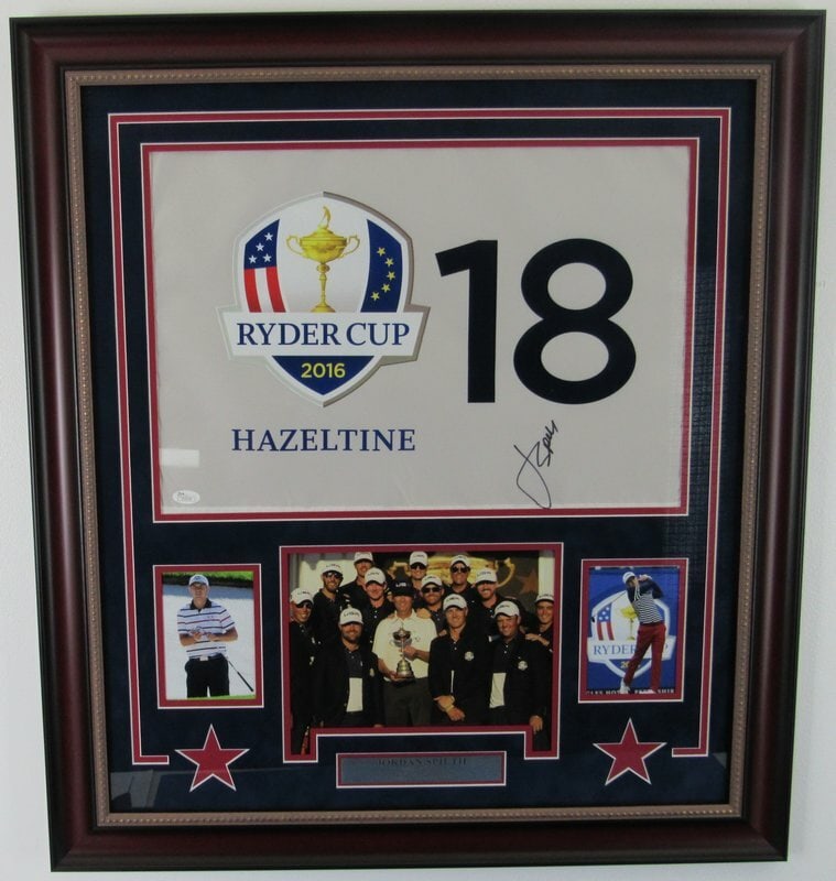 Jordan Speith Signed Hazeltine 2016 Ryder Cup Framed Pin Flag JSA 139689: Jordan Speith Signed Hazeltine 2016 Ryder Cup Framed Pin Flag JSA 139689 Signed by Jordan Speith, this framed pin flag from the 2016 Ryder Cup at Hazeltine features an official PGA authentication from