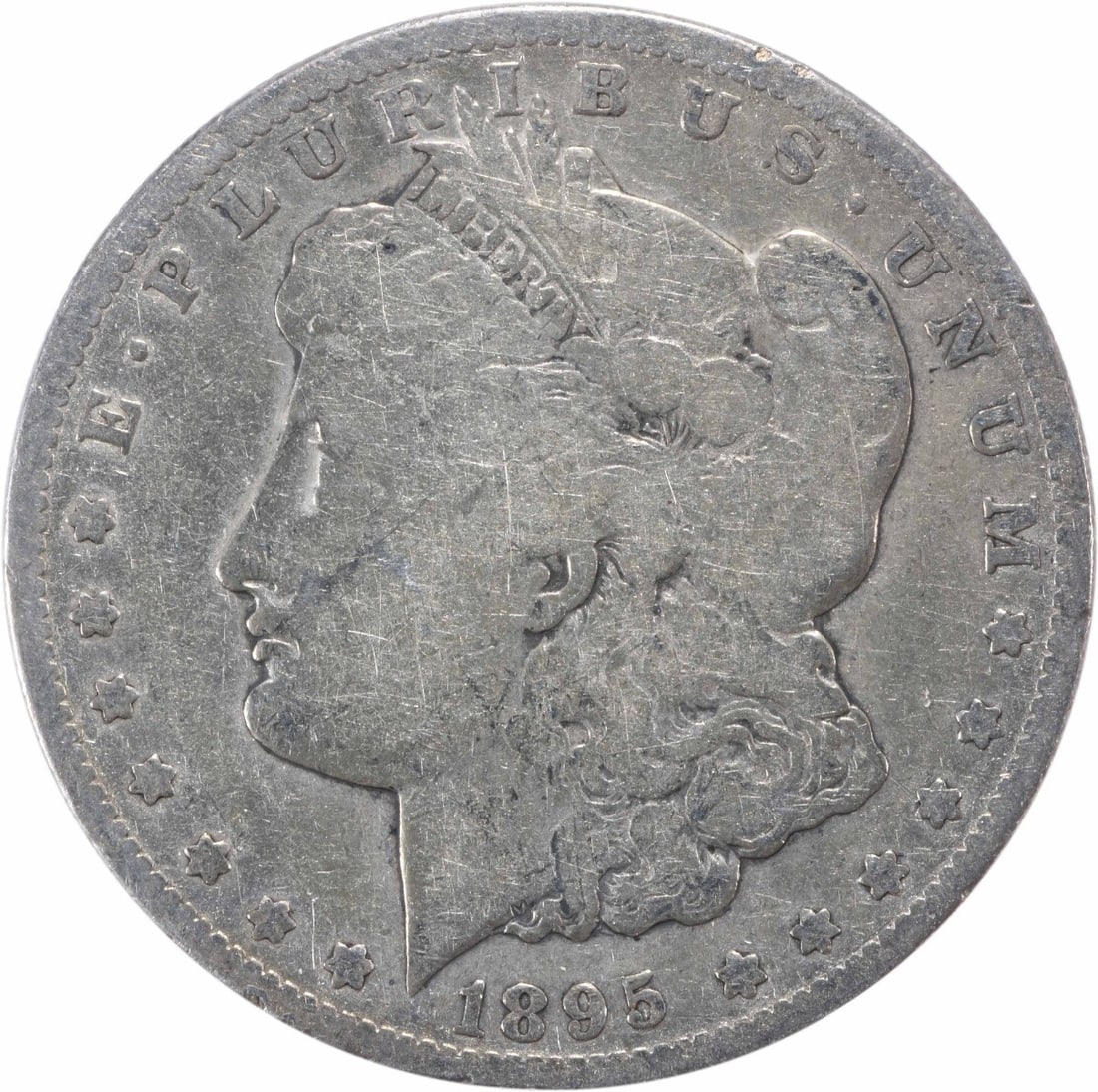 1895-S Morgan Silver Dollar VG Uncertified: 1895-S Morgan Silver Dollar VG Uncertified The 1895-S Morgan Silver Dollar features a distinctive reeded edge and a San Francisco mint mark, setting it apart from other circulated coins. Made with 90%