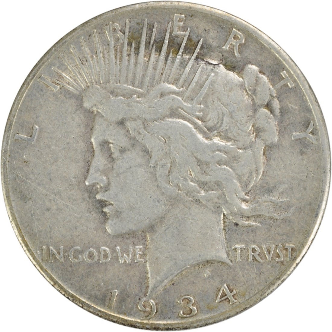 1934-S Peace Silver Dollar VF Uncertified: 1934-S Peace Silver Dollar VF Uncertified The 1934-S Peace Silver Dollar features a striking design, with the iconic Liberty profile on one side and an eagle on the other. Made from high-quality silve
