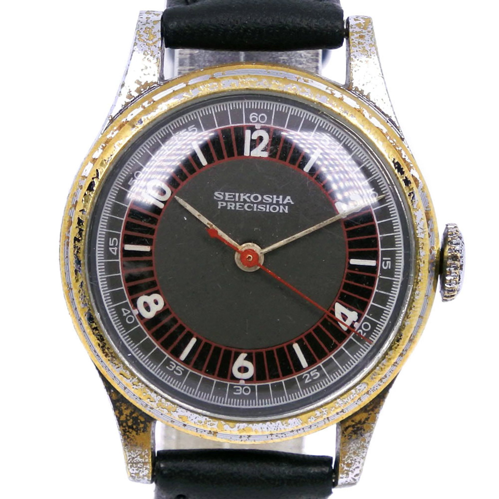 Wristwatch by Seiko: Wristwatch by Seiko Stainless steel and leather come together in this 30mm mechanical wristwatch by Seiko, featuring a manual winding movement. The gray dial provides a subtle backdrop for the watch's