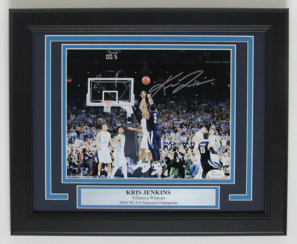 Kris Jenkins Villanova"The Shot" Signed/ Framed 8x10 Color Photo JSA 140748: Kris Jenkins Villanova"The Shot" Signed/ Framed 8x10 Color Photo JSA 140748 Kris Jenkins' iconic shot from the 2016 NCAA Championship game bears his signature, making this photo a unique piece for Vil