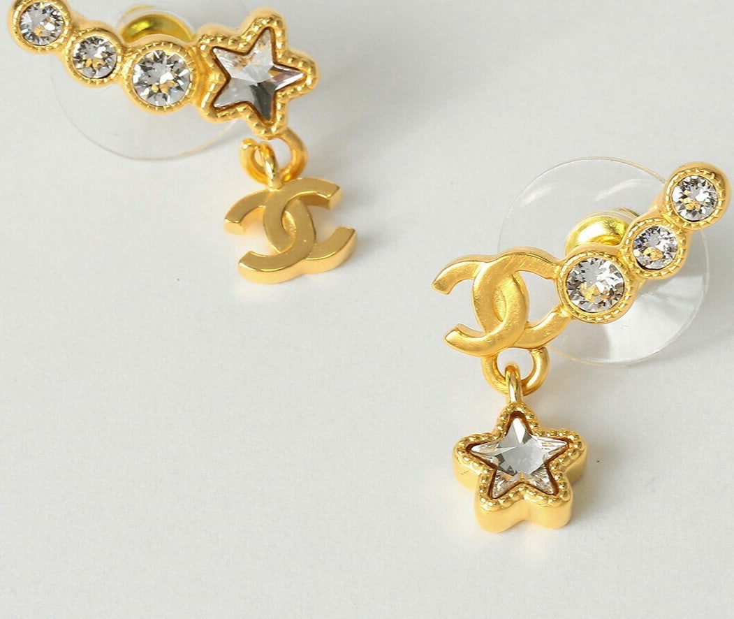 Gold tone stud earring motif star coco mark chanel a24 cc: Gold tone stud earring motif star coco mark chanel a24 cc Item Specifics: Brand: CHANEL Type: Earrings Shape: Star Closure: Stud Color: Gold Style: earring Material: Metal Product Disclaimer: Items