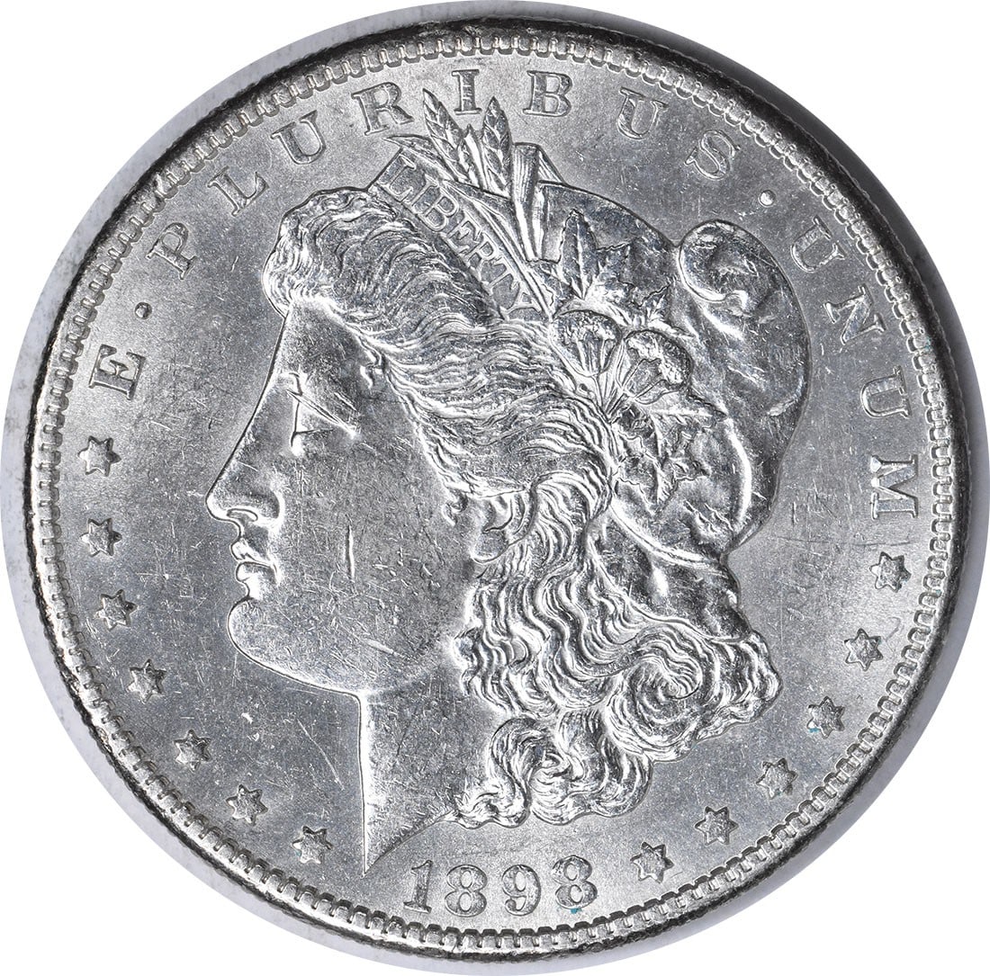 1898-S Morgan Silver Dollar AU Slider Uncertified: 1898-S Morgan Silver Dollar AU Slider Uncertified The 1898-S Morgan Silver Dollar features a unique blend of 90% silver and 10% copper, making it a rare and valuable collectible. With its reeded edge 