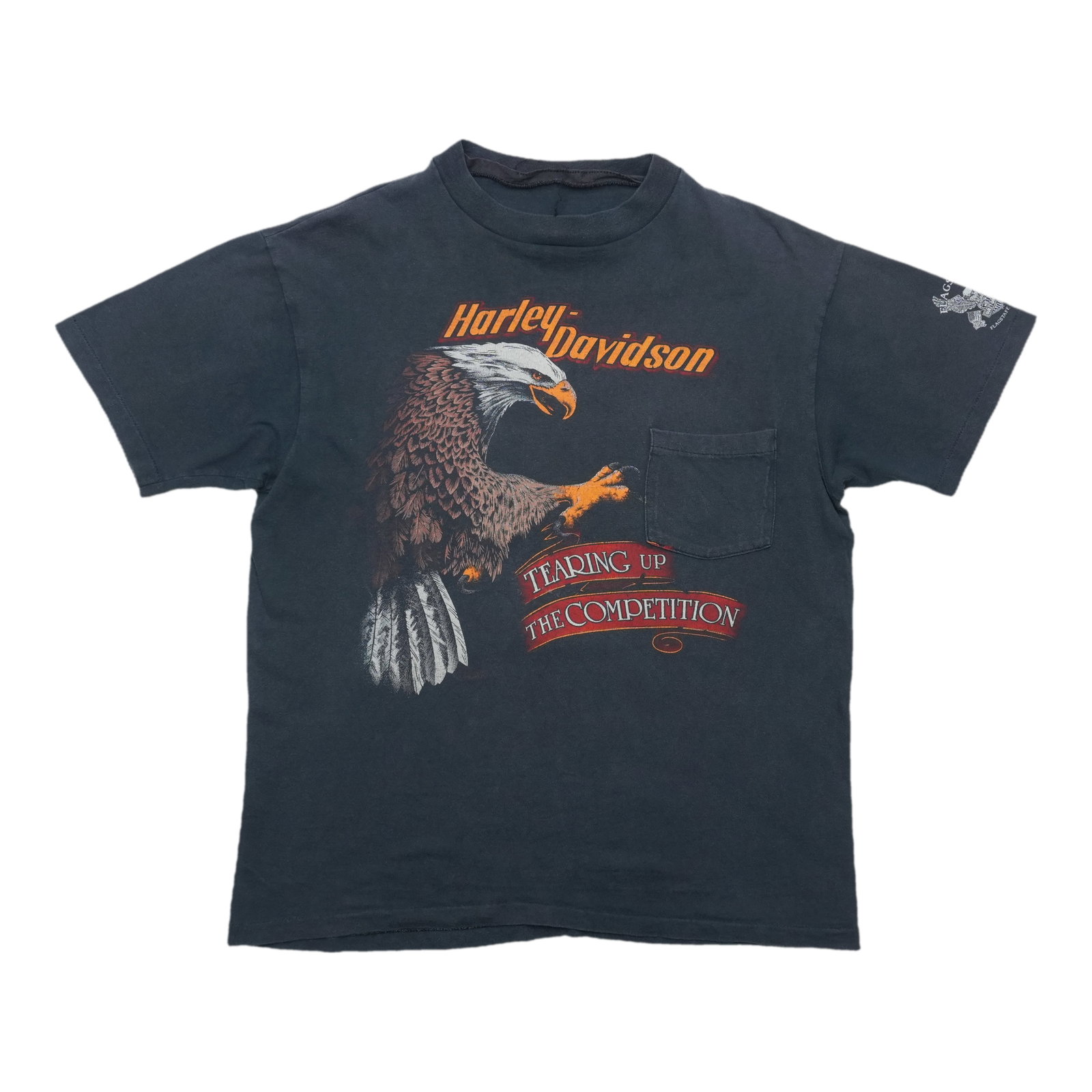 1990s Harley Davidson Tearing Up The Competition Pocket Shirt: 1990s Harley Davidson Tearing Up The Competition Pocket Shirt Tearing Up The Competition Pocket Shirt from the iconic 1990s Harley Davidson collection. This retro-style shirt boasts bold graphics and
