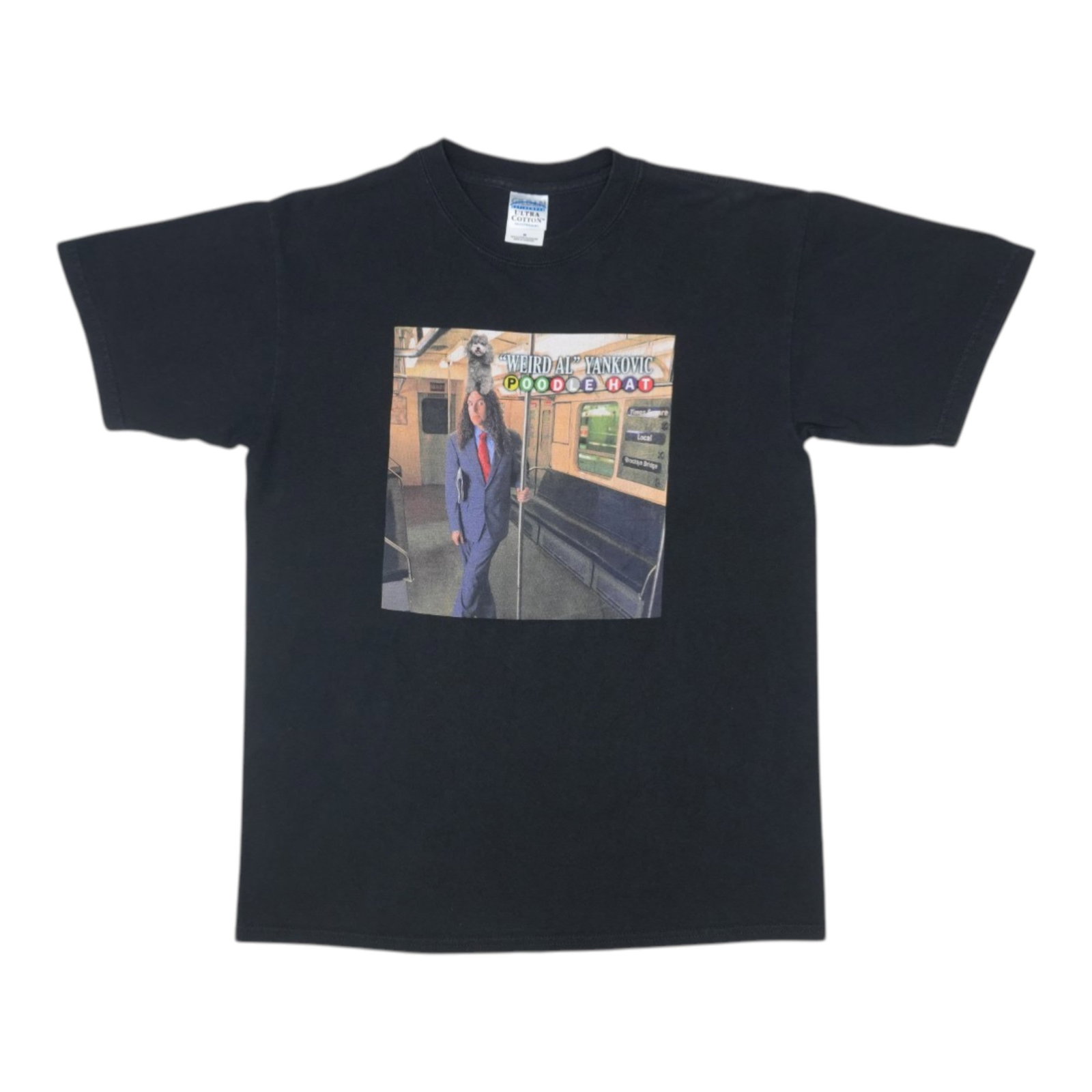 Weird Al Yankovic 2003 Poodle Hat Tour Shirt: Weird Al Yankovic 2003 Poodle Hat Tour Shirt Weird Al Yankovic's iconic Poodle Hat Tour Shirt, worn during his 2003 tour, is a must-have for fans. This vintage tour tee features the unmistakable image
