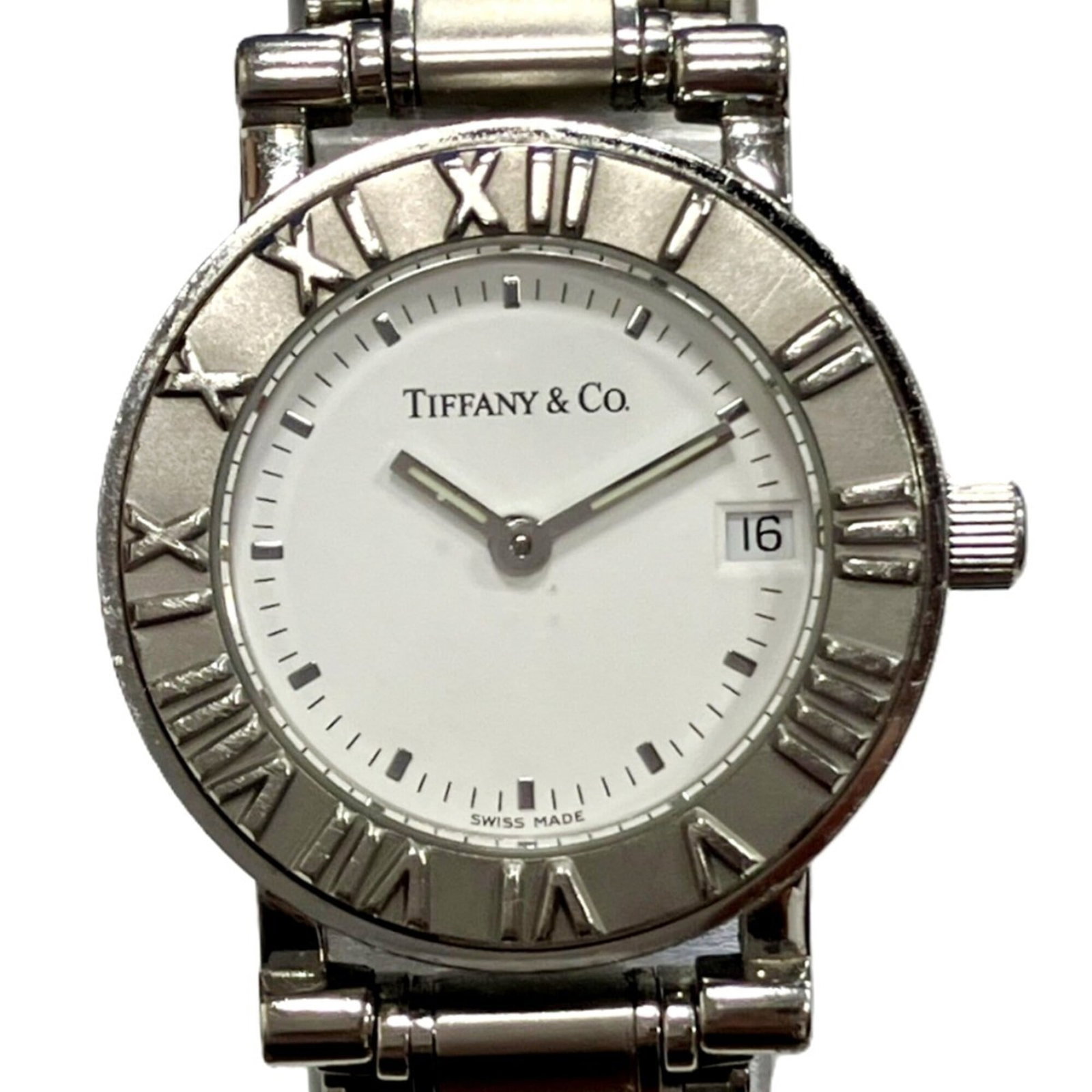 Tiffany Wristwatch: Tiffany Wristwatch Stainless steel case and band, white dial, and quartz movement make up the Tiffany wristwatch. The watch's 24.6mm diameter case fits wrists sized 16.5cm, making it suitable for thos