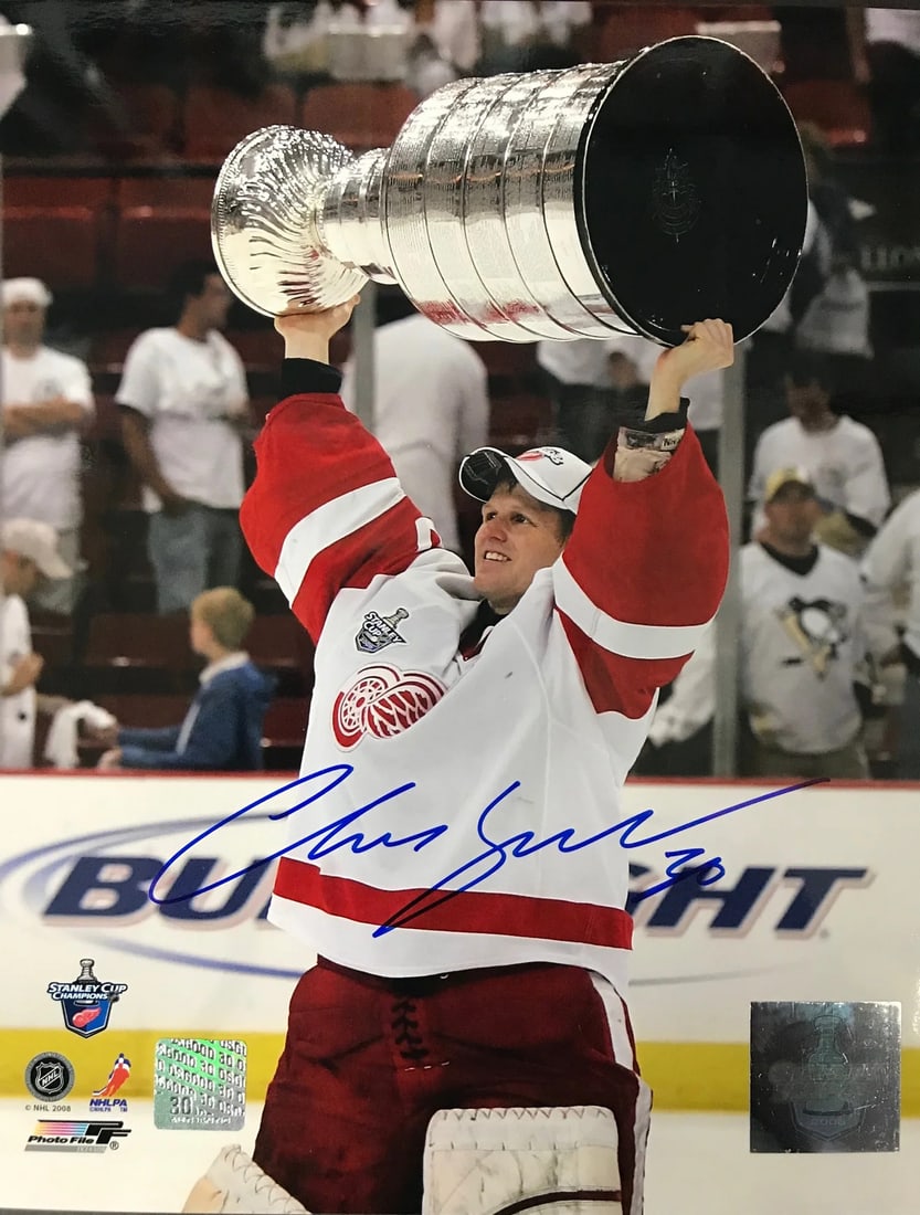 Chris Osgood Autographed 8x10 Photo Detroit Red Wings: Chris Osgood Autographed 8x10 Photo Detroit Red Wings Signed across the front in black sharpie, Chris Osgood's autograph adds a touch of authenticity to this 8x10 photo of the Detroit Red Wings. The h