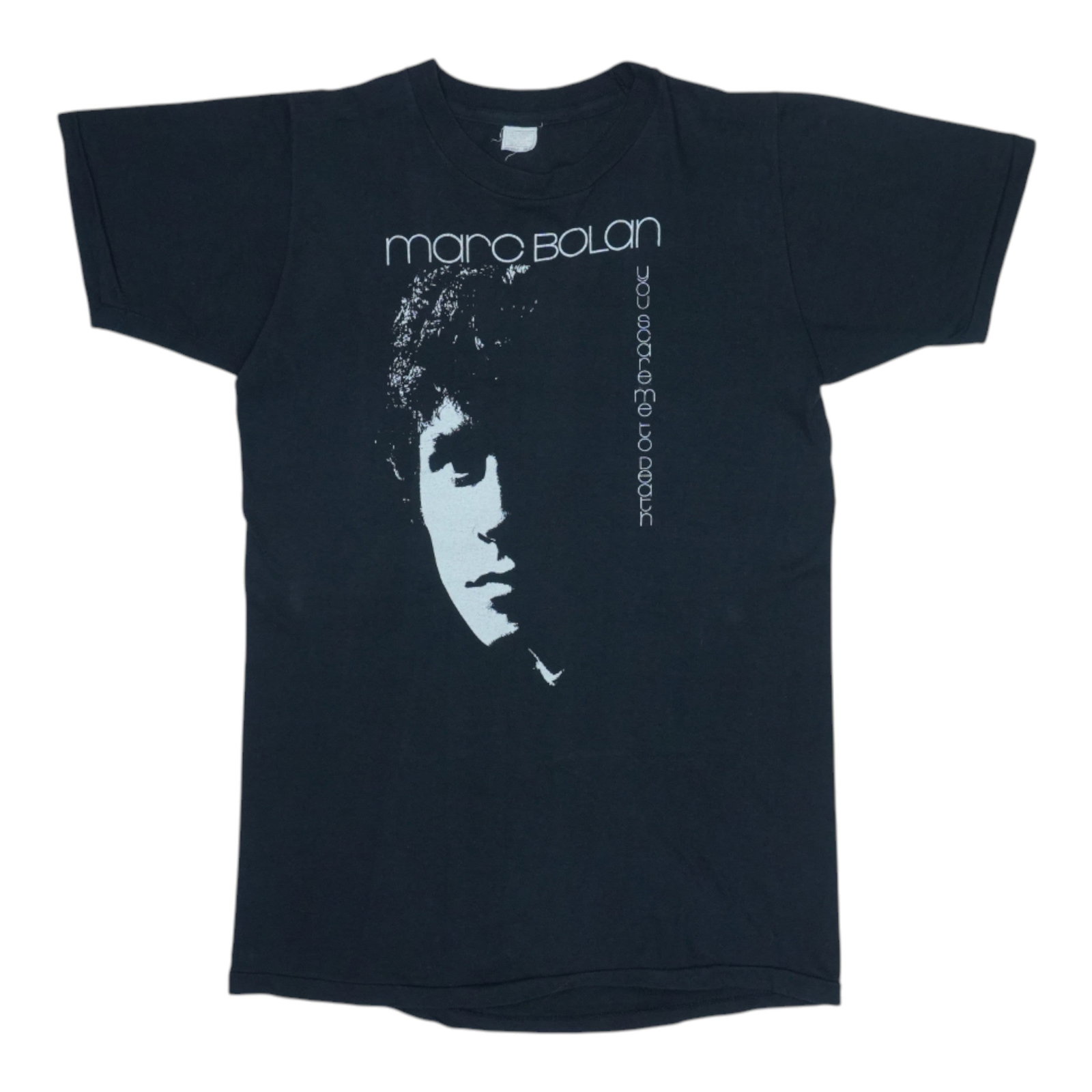 1981 Marc Bolan You Scare Me To Death Shirt: 1981 Marc Bolan You Scare Me To Death Shirt You're in luck if you're a fan of Marc Bolan's iconic style. This 1981 You Scare Me To Death shirt is a rare find for collectors, featuring the legendary T.