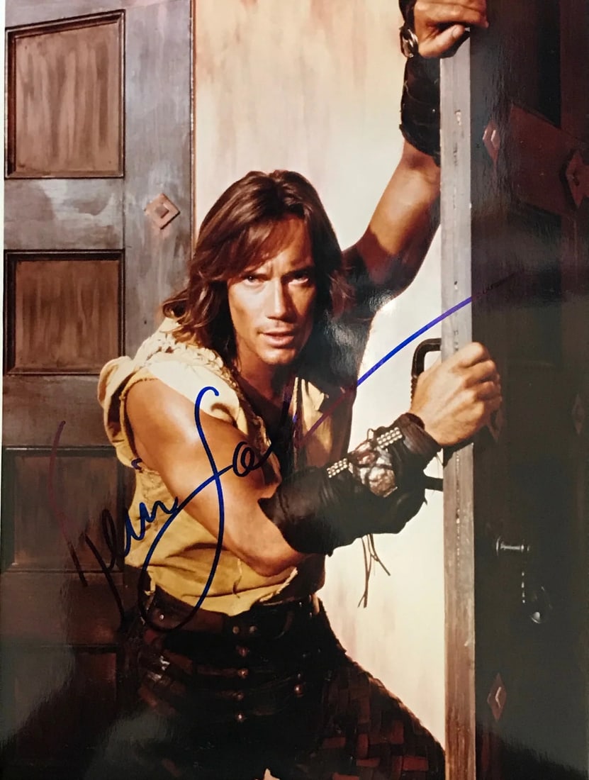 Kevin Sorbo Autographed 8x10 Celebrity Photo: Kevin Sorbo Autographed 8x10 Celebrity Photo Signed by Kevin Sorbo in blue sharpie, this 8x10 celebrity photo showcases the actor's distinctive presence. The photo bears a clear and visible signature