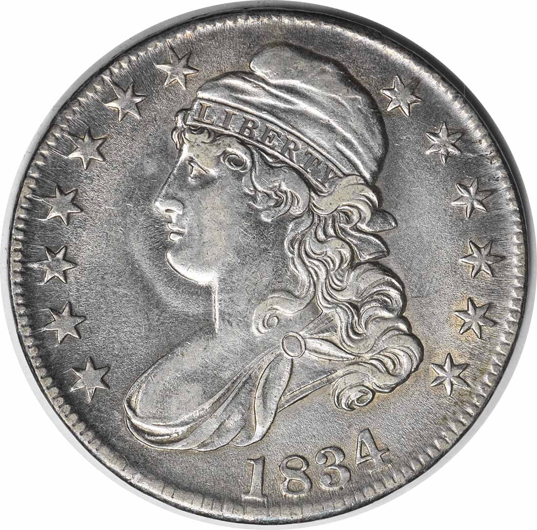 1834 Bust Half Dollar Large Date Small Letters AU Uncertified: 1834 Bust Half Dollar Large Date Small Letters AU Uncertified The 1834 Bust Half Dollar Large Date Small Letters features an elegant design with John Reich's iconic bust, set against a classic Philade