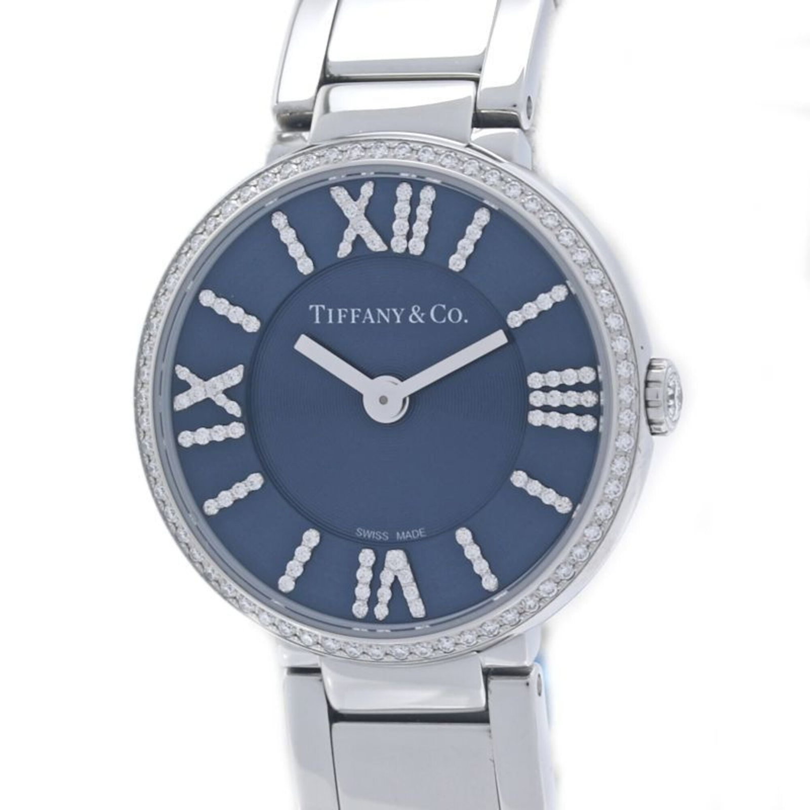 Tiffany Wristwatch: Tiffany Wristwatch Stainless steel case and band add a touch of modern sophistication to this navy quartz wristwatch, featuring a sleek 24mm diameter design. The watch's quartz movement ensures reliab