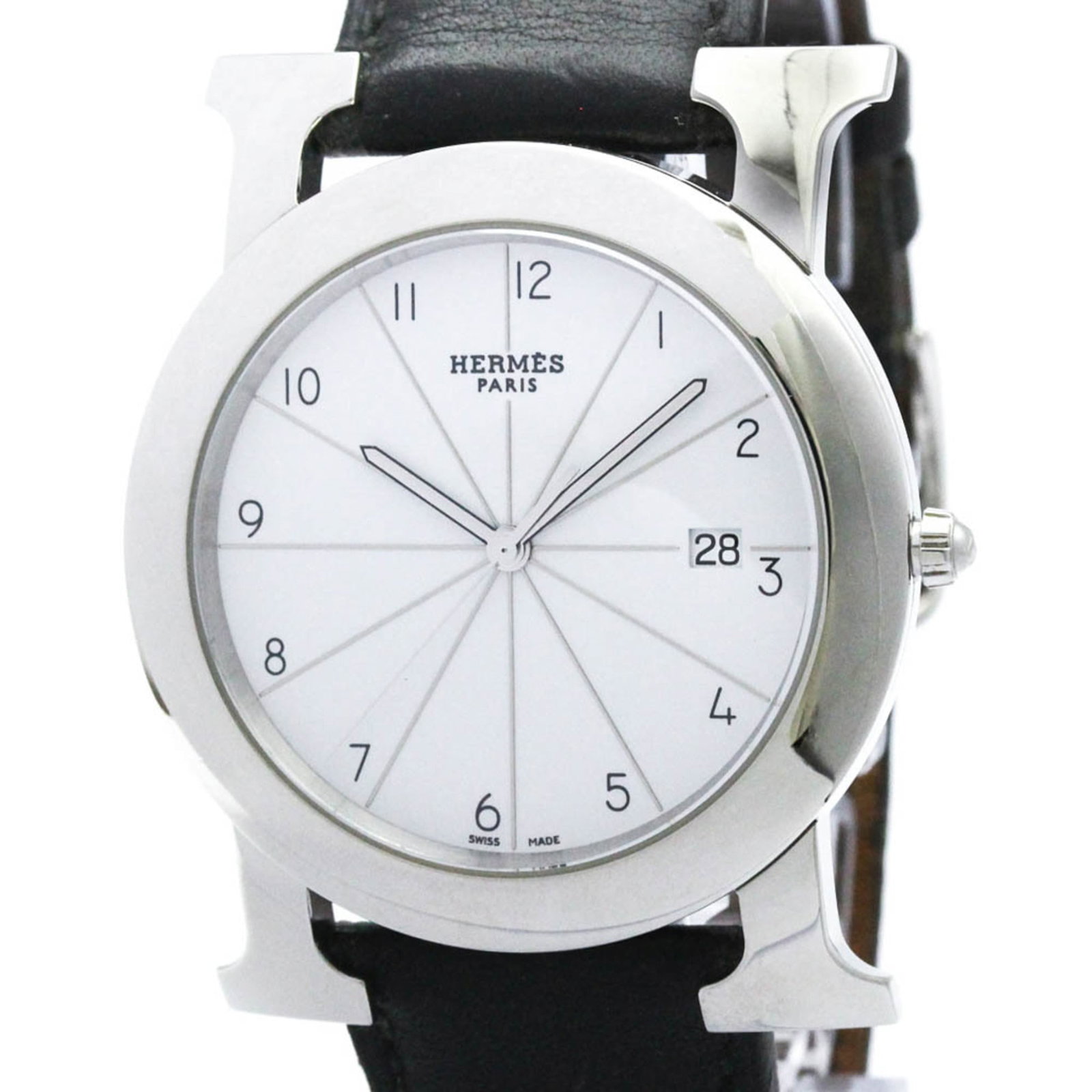Hermes Wristwatch: Hermes Wristwatch Stainless steel case and white leather band make this Herm?s Heure H wristwatch a stylish choice for formal occasions. The quartz movement ensures reliable timekeeping, while the dat
