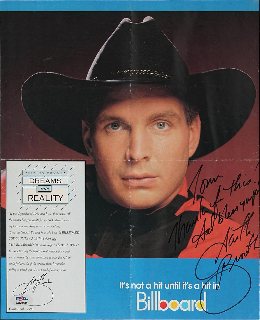 Garth Brooks Performer Signed/ Inscribed 11x14 Magazine Photo 1993 PSA/ DNA 205150: Garth Brooks Performer Signed/ Inscribed 11x14 Magazine Photo 1993 PSA/ DNA 205150 Original 11x14 magazine photo from 1993 featuring Garth Brooks, signed and inscribed by the performer. This rare coll