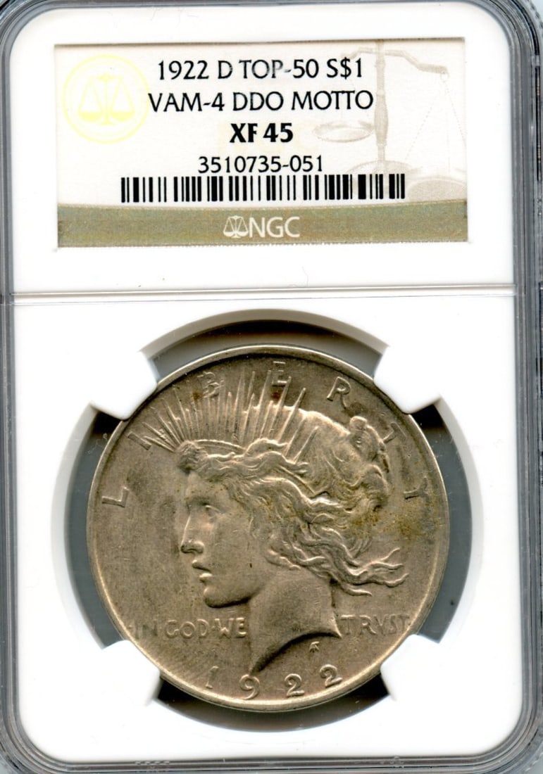 C5587- 1922-D VAM-4 DDO MOTTO TOP 50 PEACE DOLLAR NGC XF45: C5587- 1922-D VAM-4 DDO MOTTO TOP 50 PEACE DOLLAR NGC XF45 The 1922-D VAM-4 DDO Motto Top 50 Peace Dollar features a distinctive design, with the motto "E Pluribus Unum" prominently displayed on the t