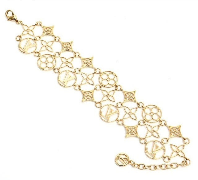 Gold tone wide bracelet gold in lace flower monogram lv louis vuitton rare: Gold tone wide bracelet gold in lace flower monogram lv louis vuitton rare Item Specifics: Brand: Louis Vuitton Type: Bracelet Color: Gold Style: Bangle Material: Metal Product Disclaimer: Items may e