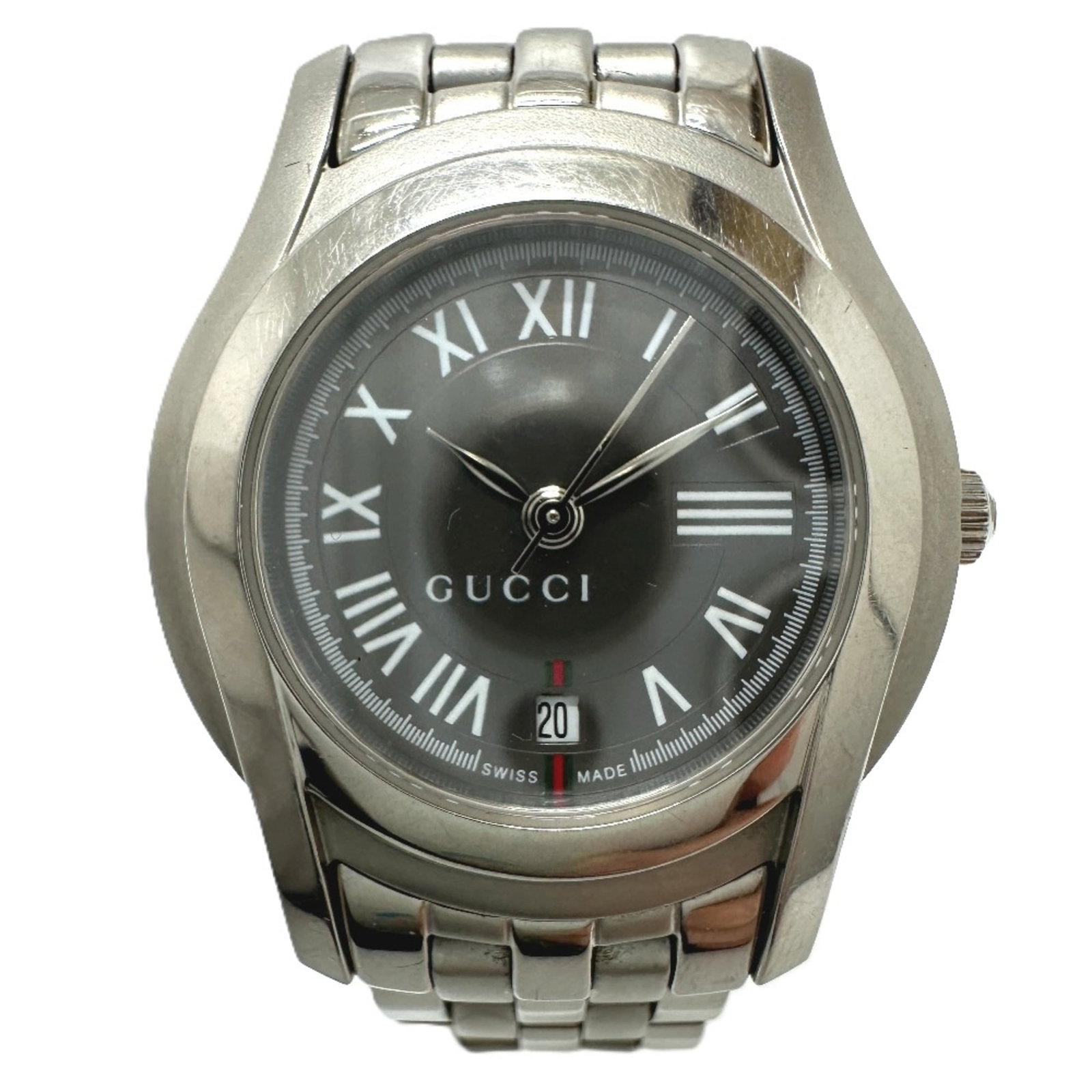 Wristwatch from Gucci: Wristwatch from Gucci Stainless steel case and band give this Gucci wristwatch a sleek, modern look. The gray analog dial features a classic design with date display, making it easy to keep track of t