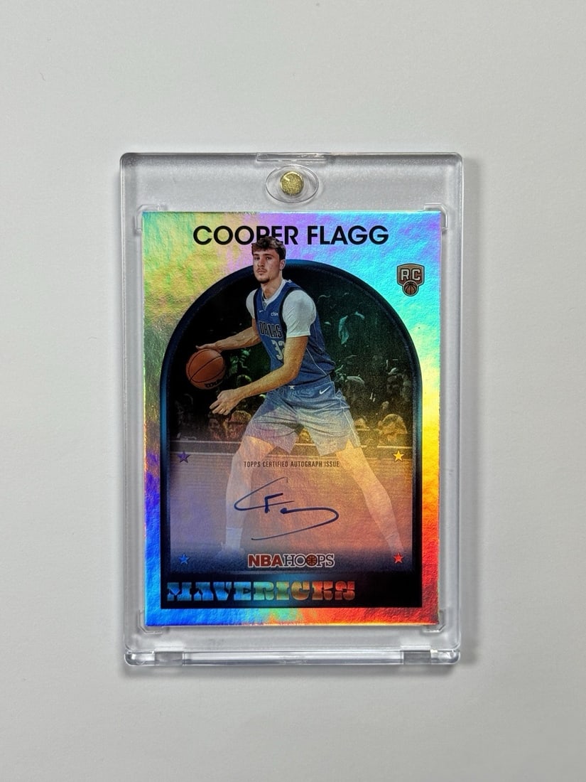 2026 TOPPS NBA HOOPS COOPER FLAGG #89S-CF ROOKIE AUTO: 2026 TOPPS NBA HOOPS COOPER FLAGG #89S-CF ROOKIE AUTO Signed by Cooper Flagg, the rookie sensation from the Dallas Mavericks, this 2026 Topps NBA Hoops card features an authentic autograph. A must-hav