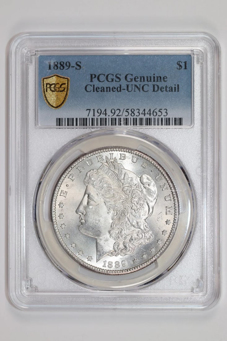 MORGAN DOLLAR 1889-S PCGS UNC: MORGAN DOLLAR 1889-S PCGS UNC The Morgan Dollar 1889-S PCGS UNC features a striking design with no mint mark, showcasing the iconic Liberty head on the obverse and an eagle on the reverse. Certified b