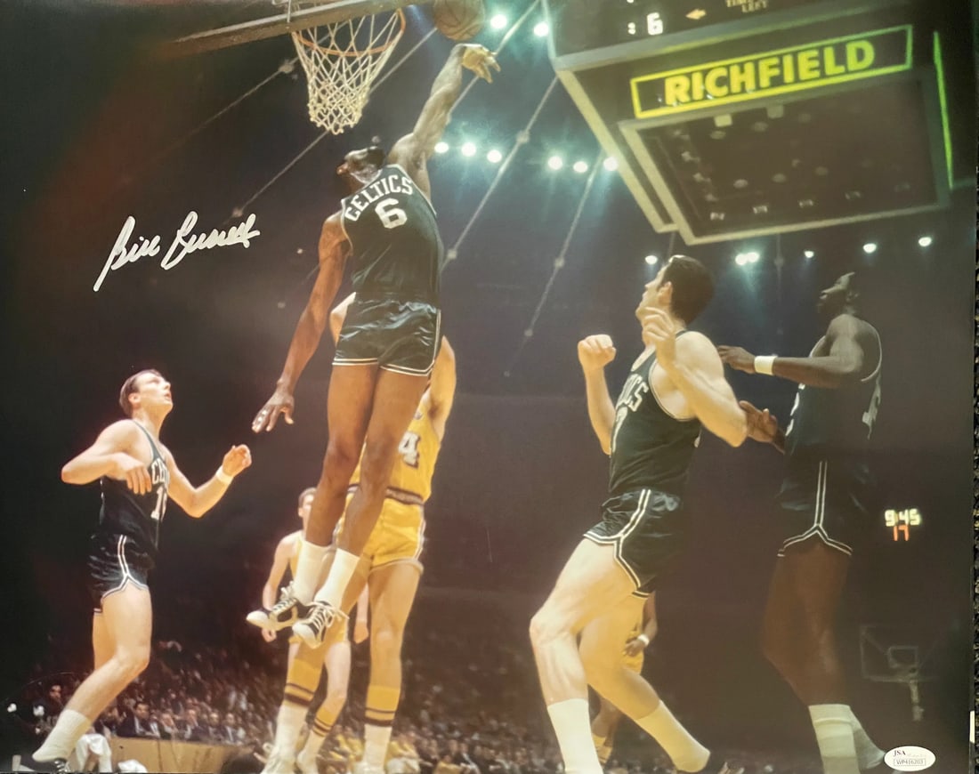 Russell Autographed 16x20 Photo vs Lakers By JSA: Russell Autographed 16x20 Photo vs Lakers By JSA Authentic Bill Russell Autographed 16x20 Photo vs Lakers Signed across the front in silver sharpie by James Spence Authentication (JSA). This photo mea