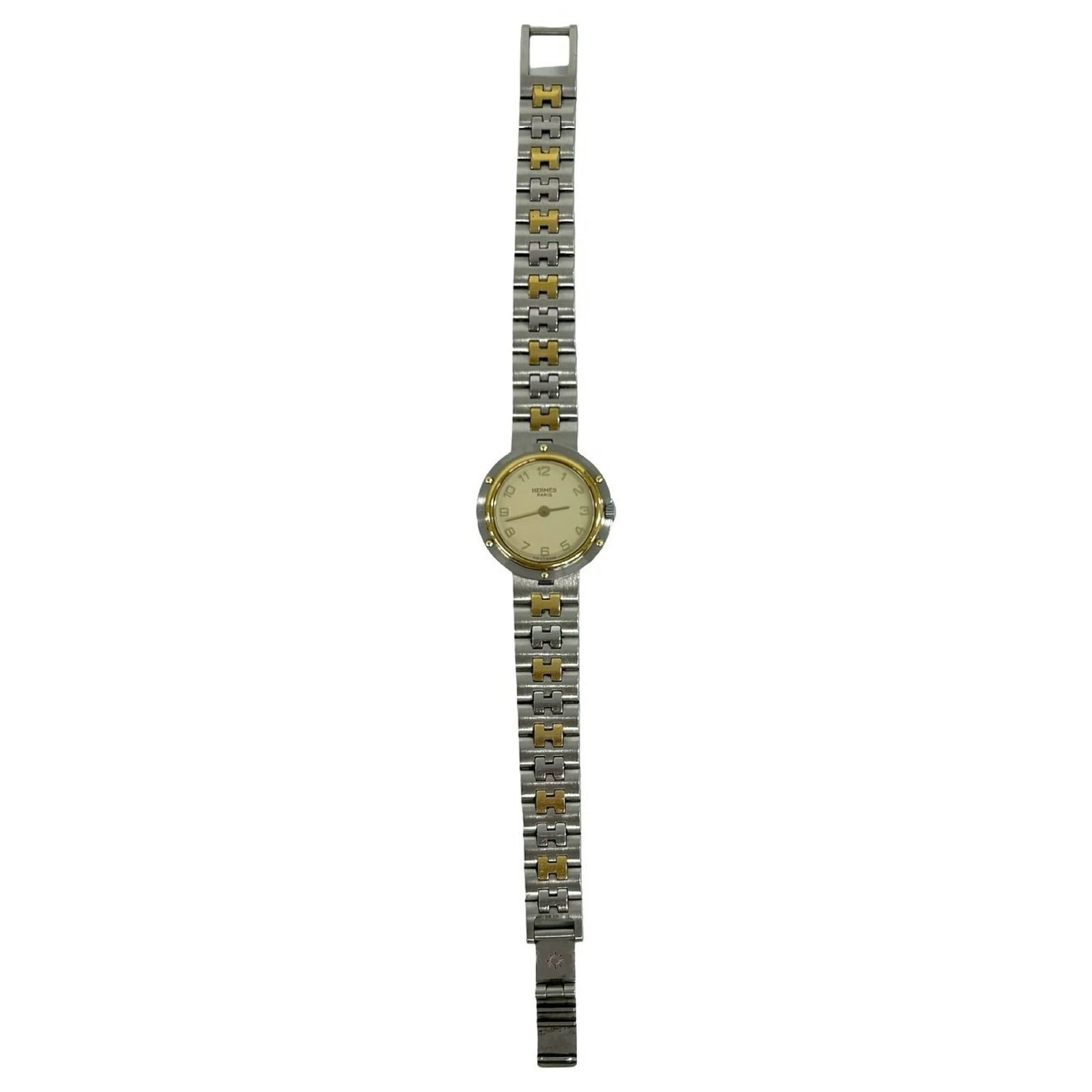 Hermes Wristwatch: Hermes Wristwatch Gold plated and stainless steel, this Herm?s wristwatch boasts a sleek design with a 14mm case diameter. The quartz movement ensures reliable timekeeping, while the gold plated band